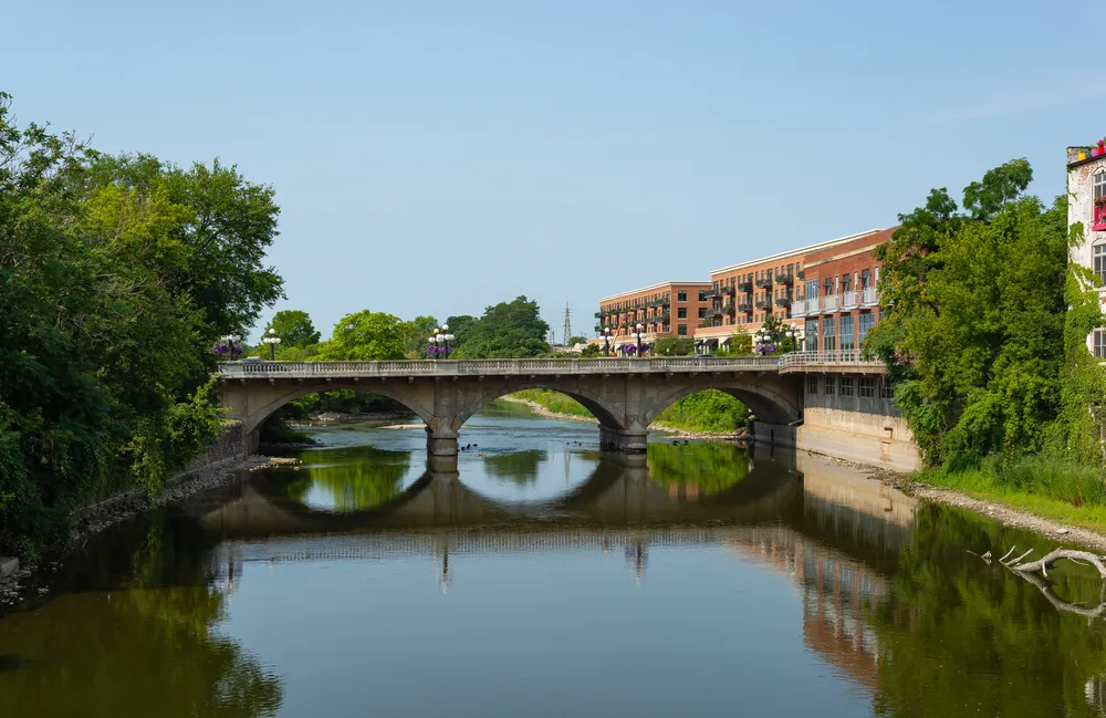 Looking down the Fox River on a beautiful Summer morning. Aurora, Illinois, USA