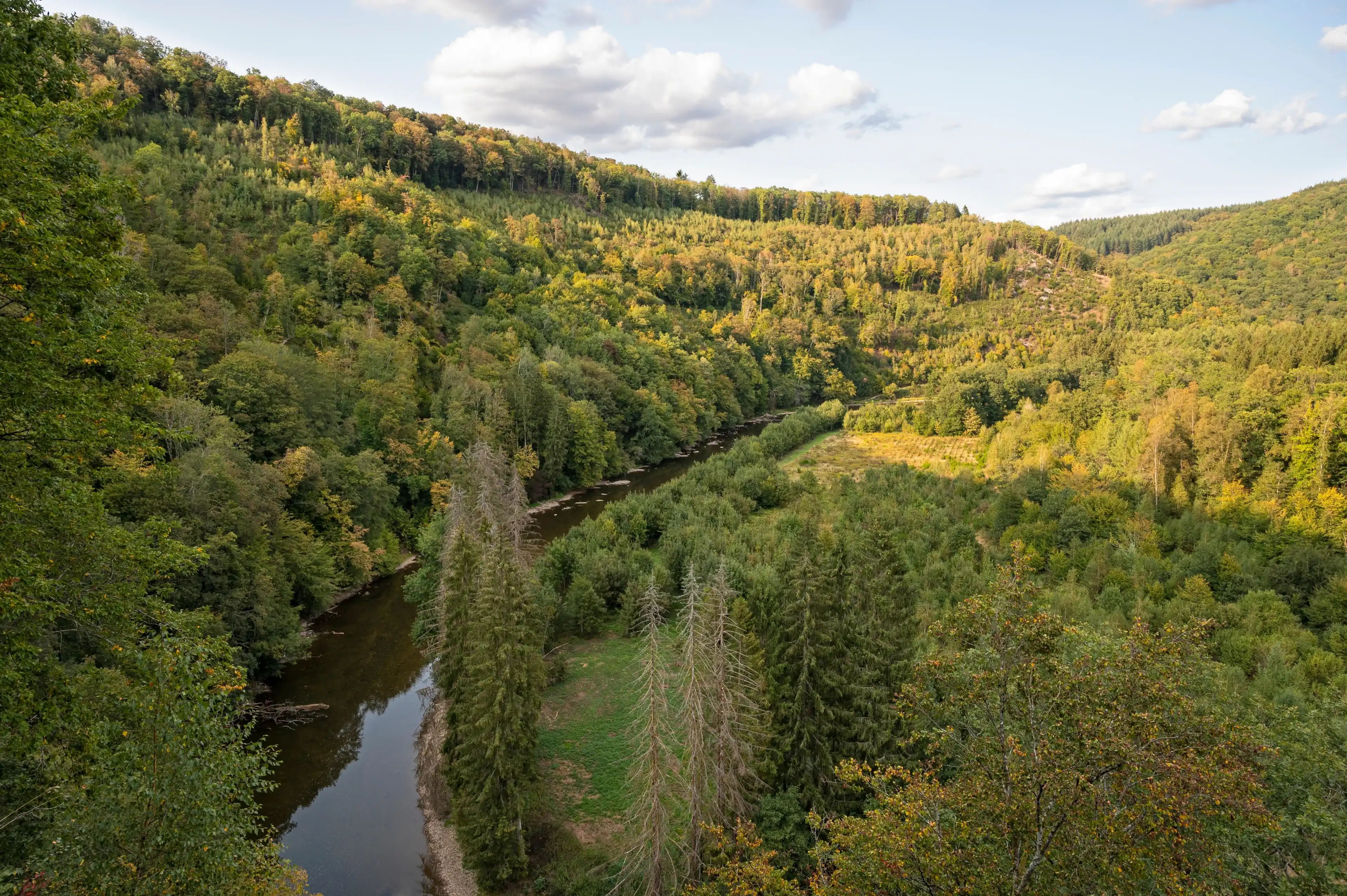 A view of the meandering Semois near the top of Les échelles de Rochehaut, one of the more adventurous hikes in Belgium. A view of the meandering Semois near the top of Les échelles de Rochehaut, one of the more adventurous hikes in Belgium.