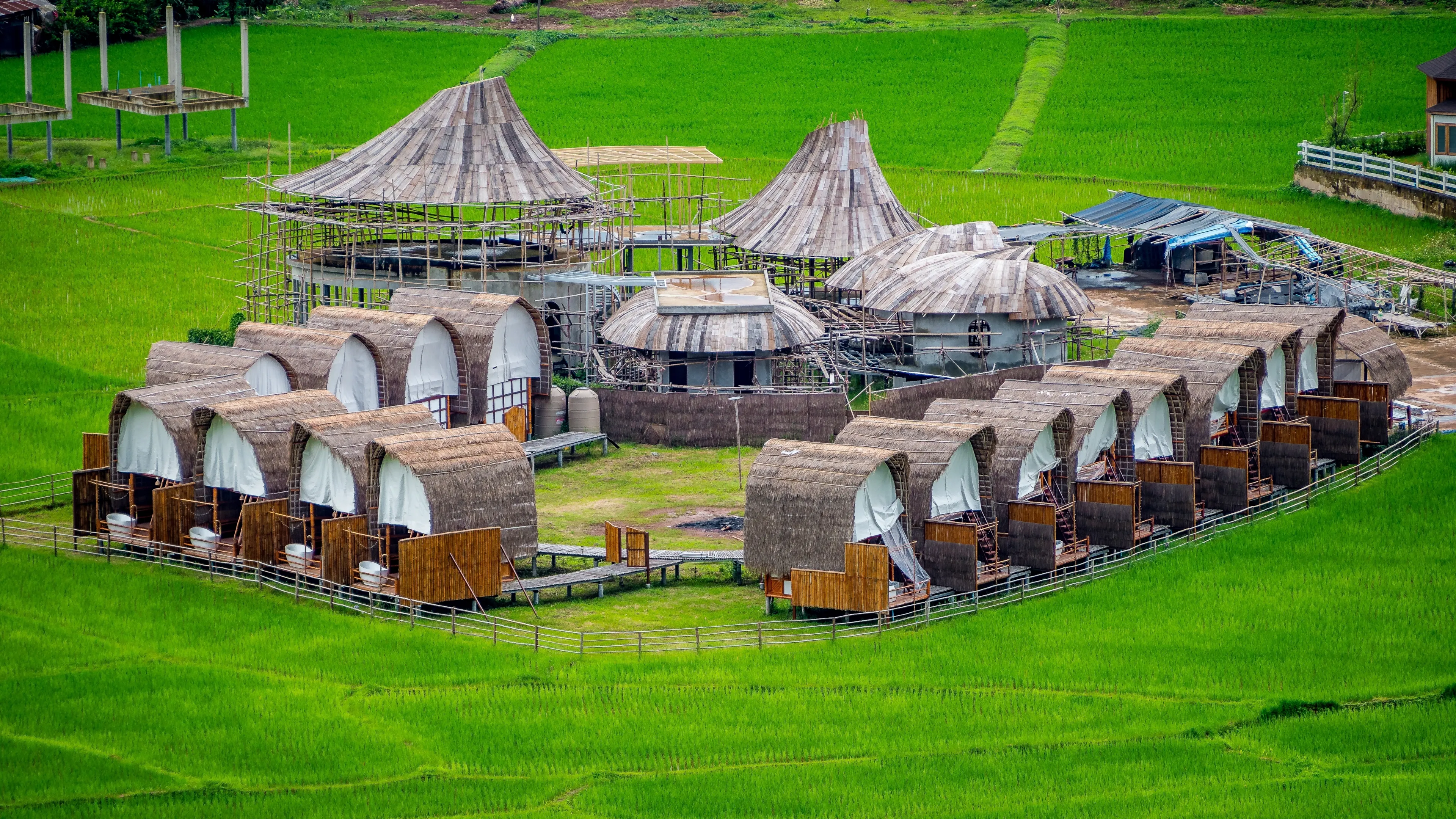 Nan, Thailand, Aug 5, 2023 - Sapan Village and rice filed with mountain surrounded