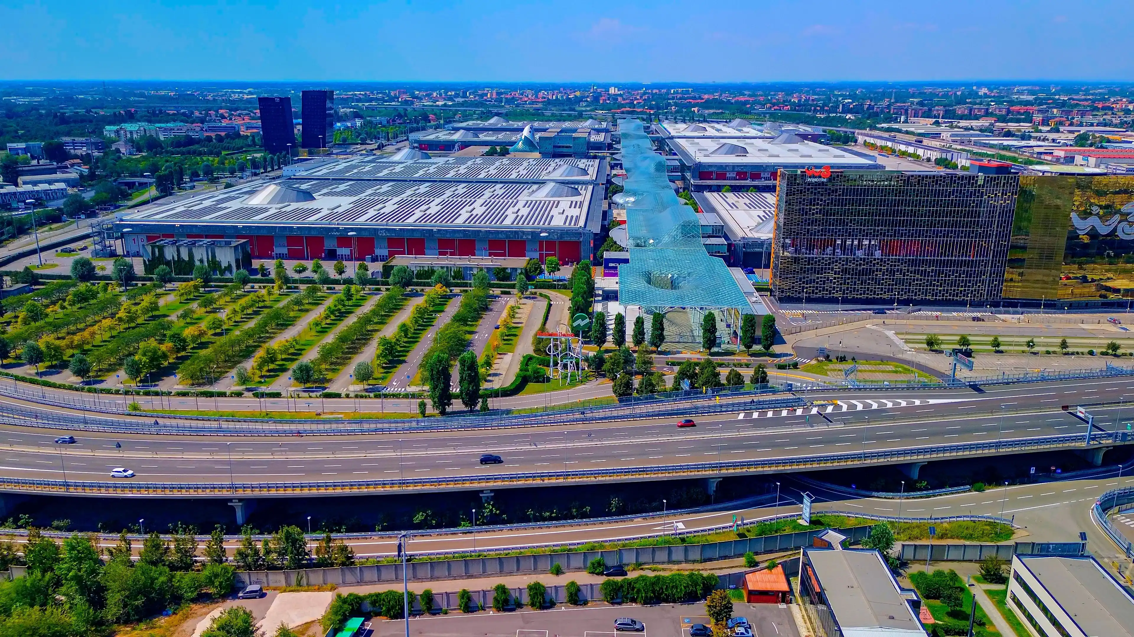 Aerial view of the Rho Fiera Milano exhibition center, holding events of international fairs and exhibitions in its padillions. Expo zone. Exhibitions of industrialists. Milan Italy 10.2023 Aerial view of the Rho Fiera Milano exhibition center, holding events of international fairs and exhibitions in its padillions. Expo zone. Exhibitions of industrialists. Milan Italy 10.2023