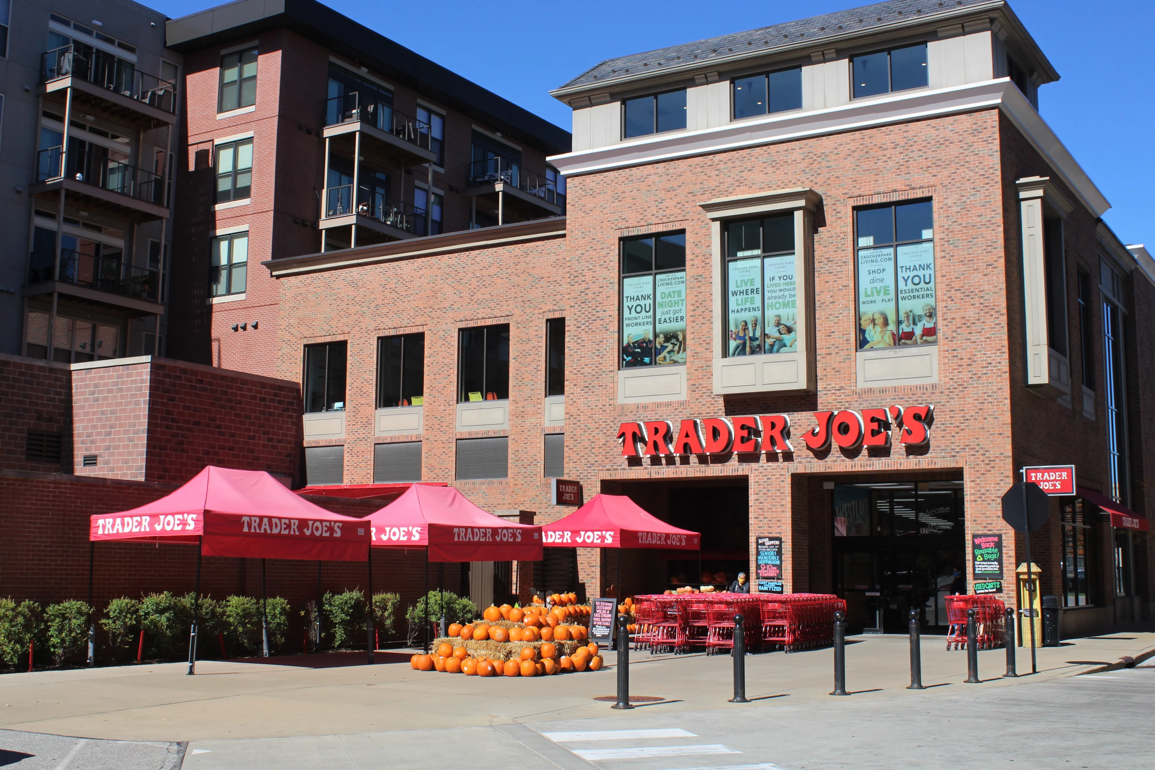 WESTLAKE OHIO - OCTOBER 2020: Trader Joe's grocery store facade and plaza with tents and pumpkins in October 2020 in Westlake Ohio.