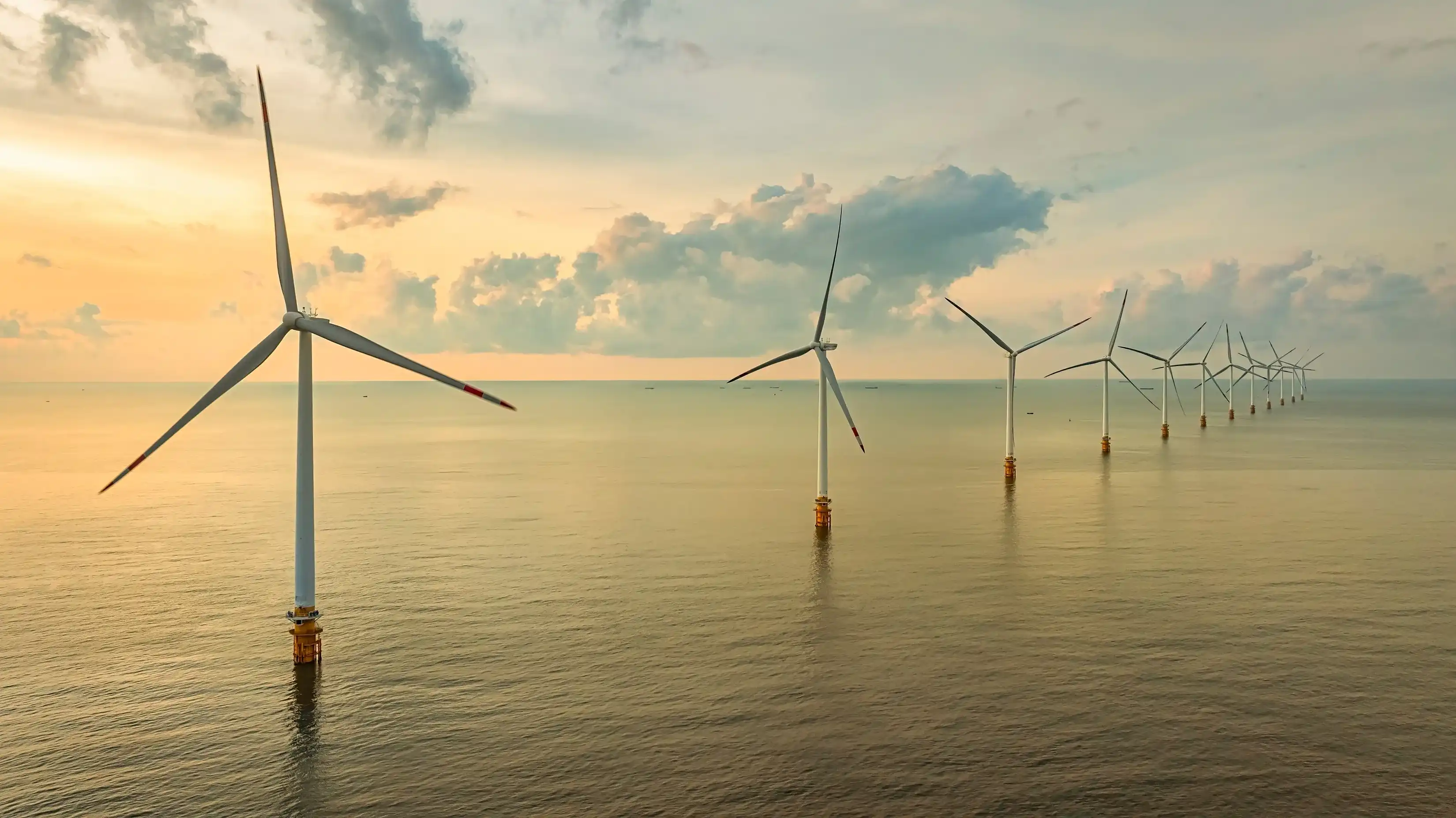 Landscape with Turbine Green Energy Electricity, Windmill for electric power production, Wind turbines generating electricity on ocean at Ba Dong, Tra Vinh, Vietnam. Clean energy concept. Landscape with Turbine Green Energy Electricity, Windmill for electric power production, Wind turbines generating electricity on ocean at Ba Dong, Tra Vinh, Vietnam. Clean energy concept.