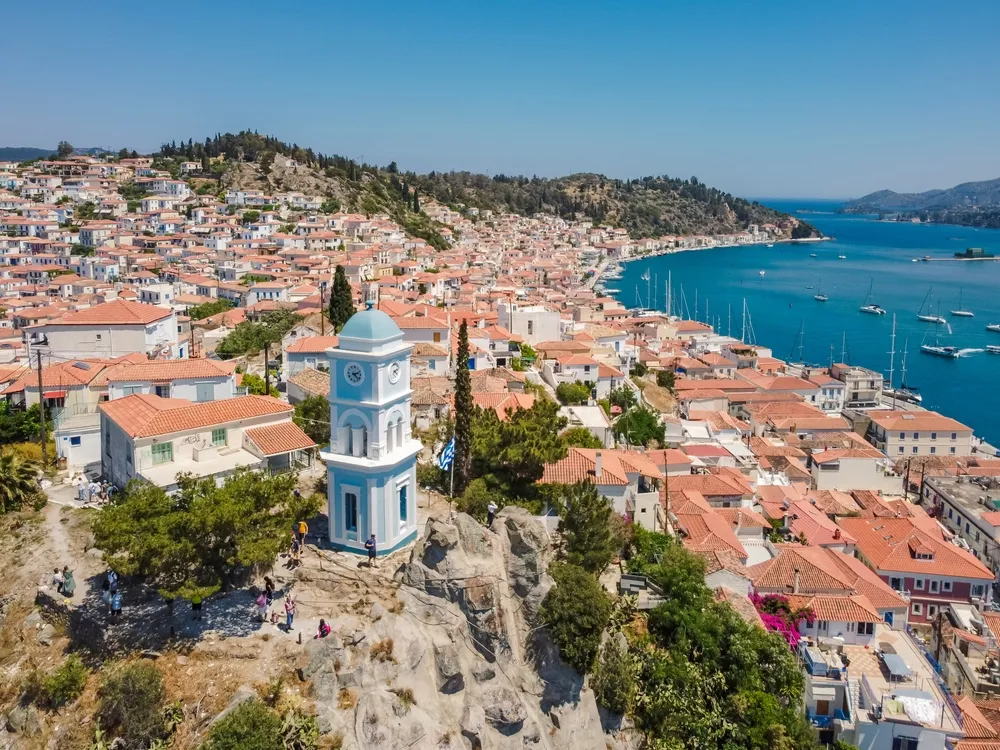 Aerial view Poros island by drone. Summer Greece. Beach. Mediterranean sea.