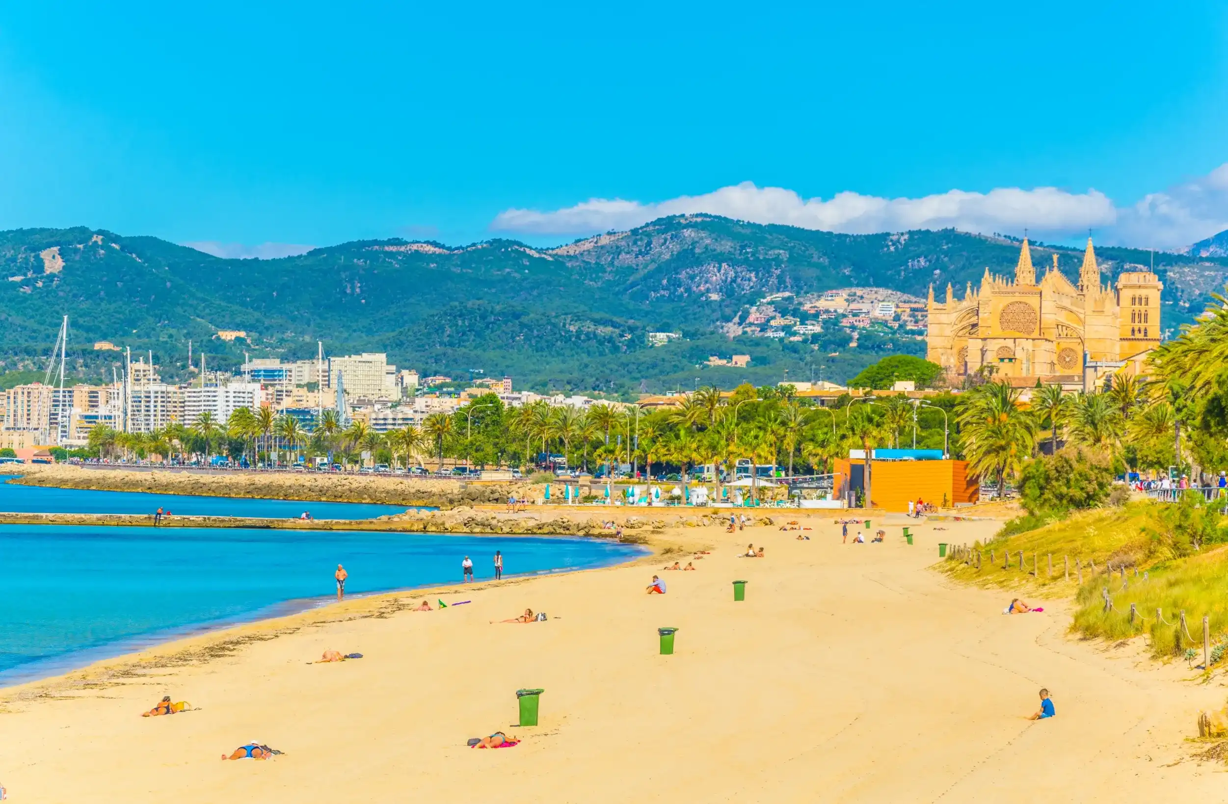 Beach at Palma de Mallorca with the cathedral at background, Spain Beach at Palma de Mallorca with the cathedral at background, Spain