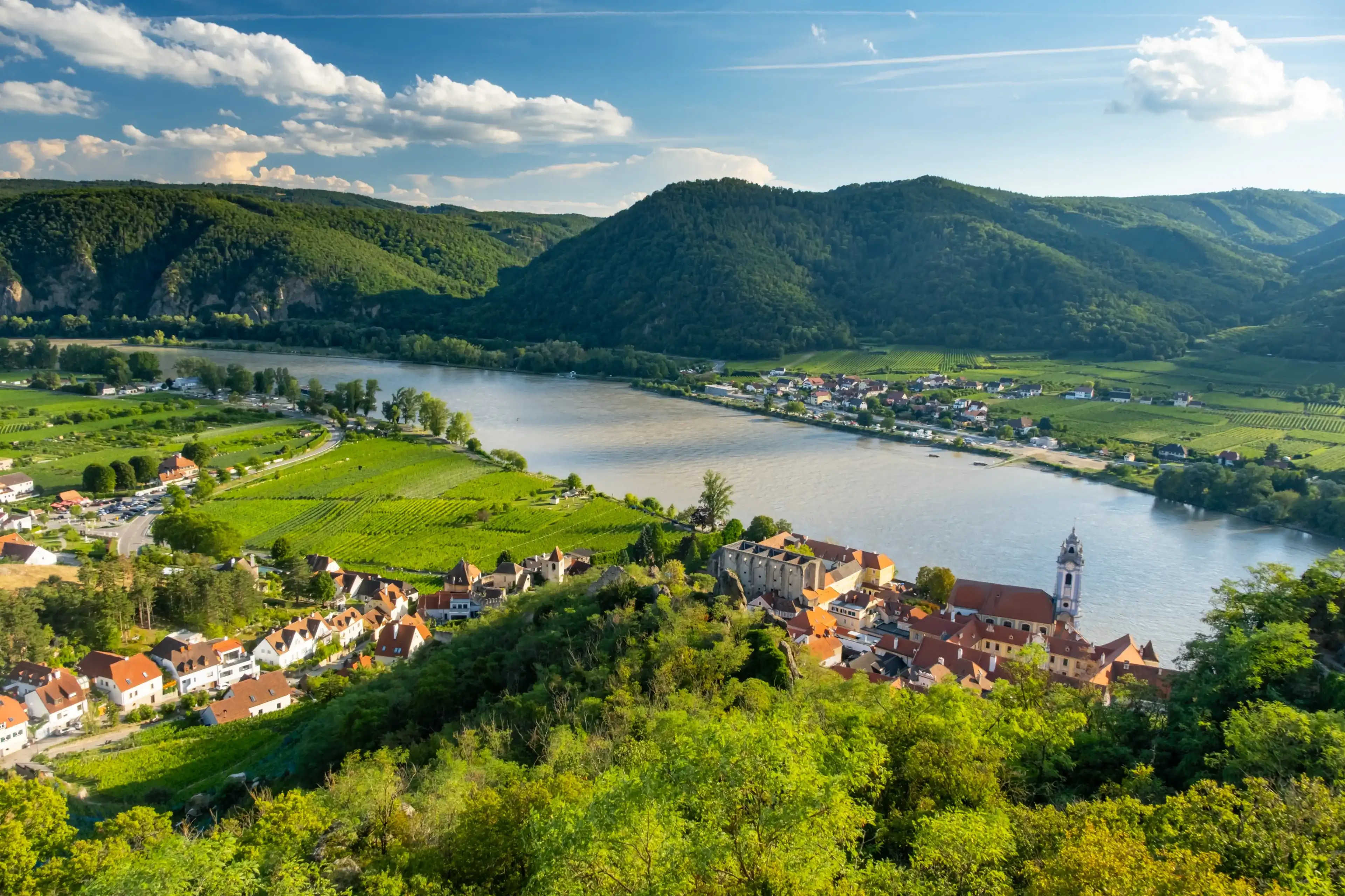 Panorama of Wachau valley with Danube river near Duernstein village in Lower Austria. Traditional wine and tourism region, Danube cruises. Panorama of Wachau valley with Danube river near Duernstein village in Lower Austria. Traditional wine and tourism region, Danube cruises.