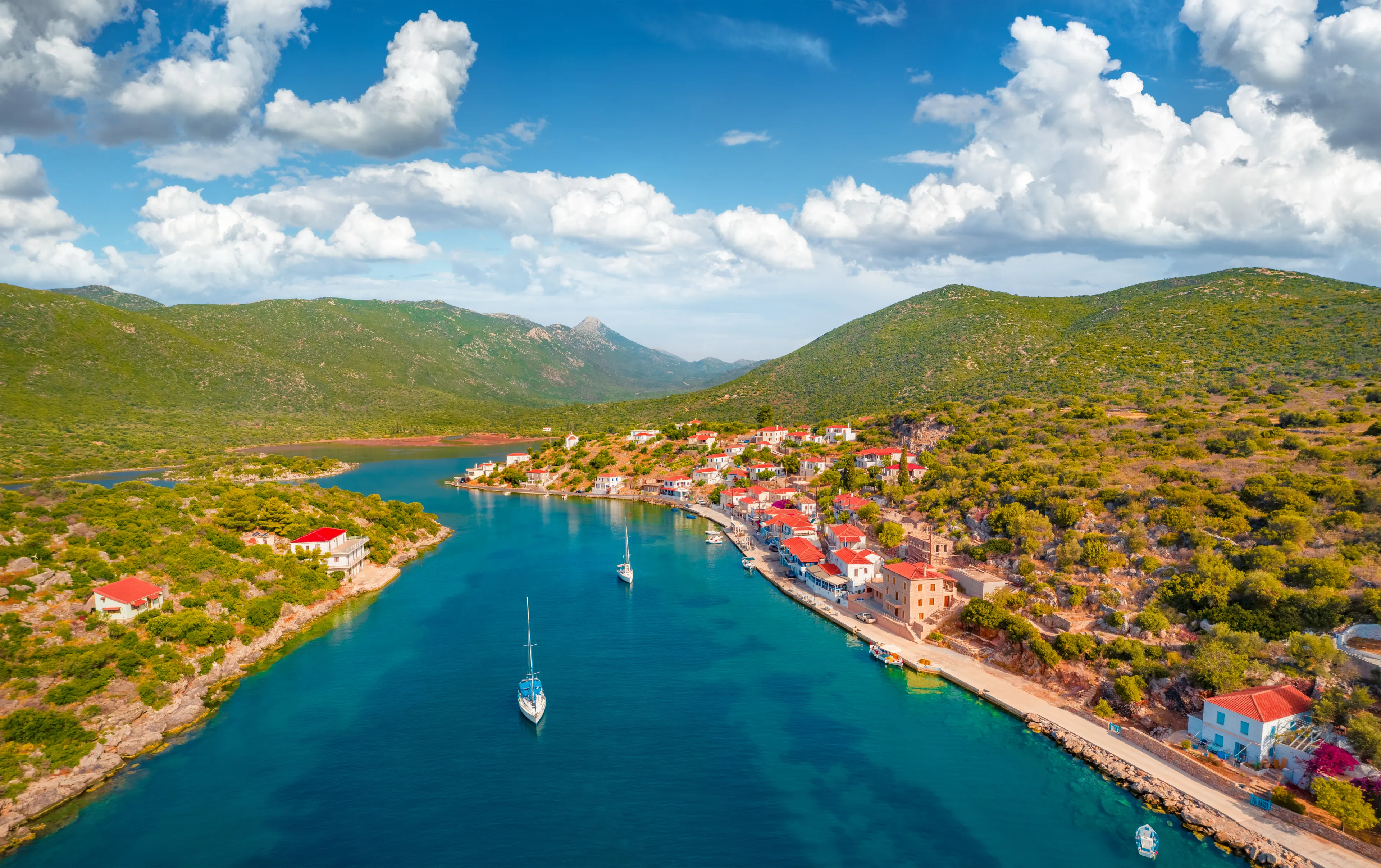 View from flying drone of Limin Ieraka village. Spectacular outdoor scene of Peloponnese peninsula, Greece, Europe. Wonderful morning seascape of Myrtoa sea. Traveling concept background.