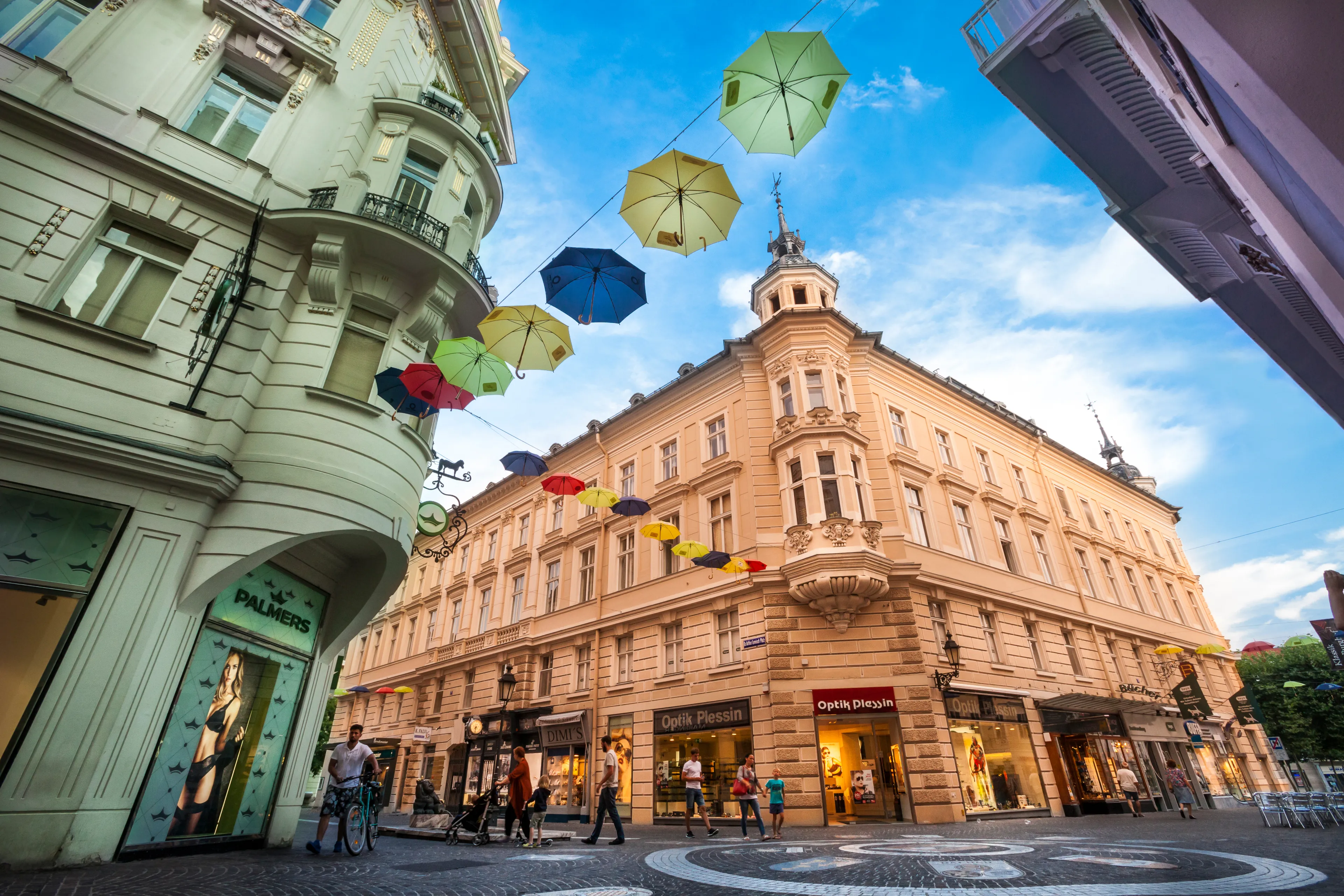 KLAGENFURT, AUSTRIA. August 15, 2015: Buildings and city life in Klagenfurt am Wörthersee, the capital of the federal state of Carinthia in Austria. 