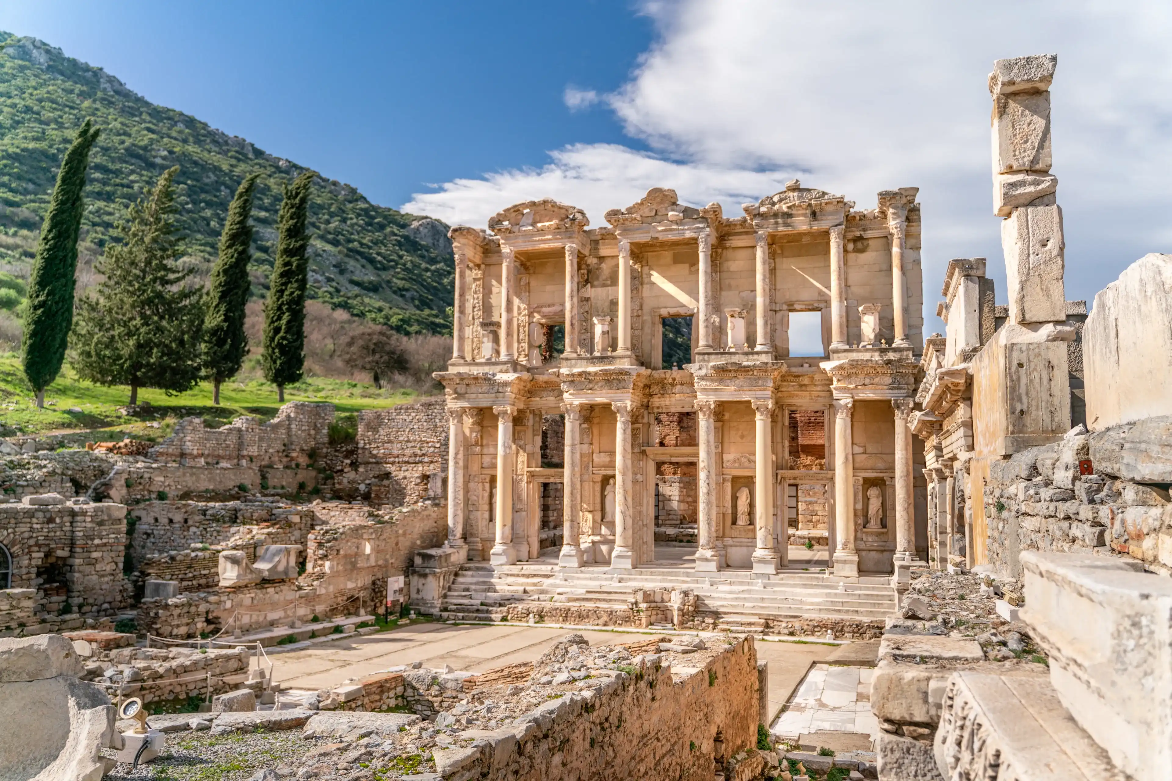 Celsus Library in Ephesus in Selcuk (Izmir), Turkey. Marble statue is Sophia, Goddess of Wisdom, at the Celcus Library at Ephesus, Turkey. The ruins of the ancient antique city. Celsus Library in Ephesus in Selcuk (Izmir), Turkey. Marble statue is Sophia, Goddess of Wisdom, at the Celcus Library at Ephesus, Turkey. The ruins of the ancient antique city.