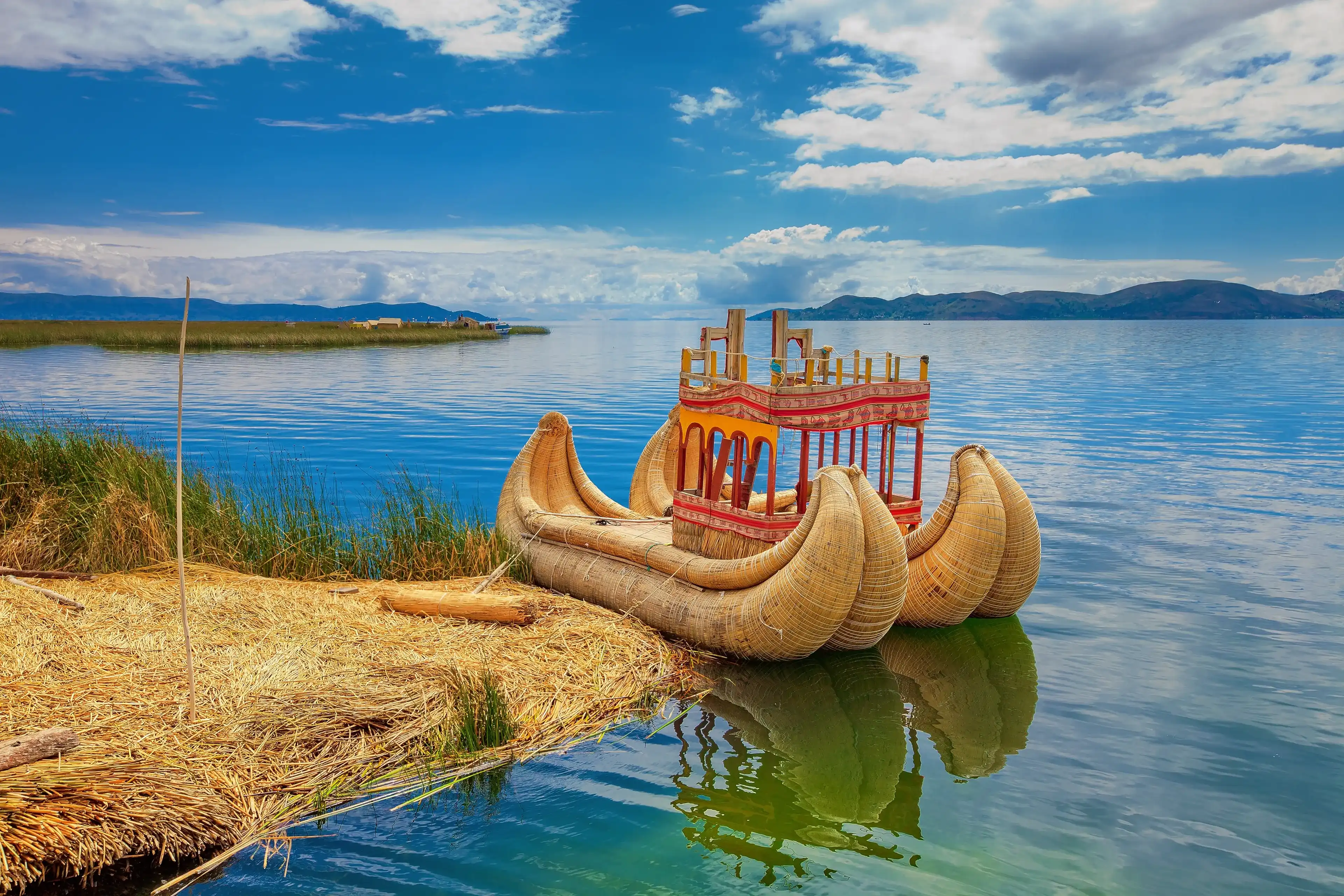 A boat parked on the island of Uros, Puno A boat parked on the island of Uros, Puno