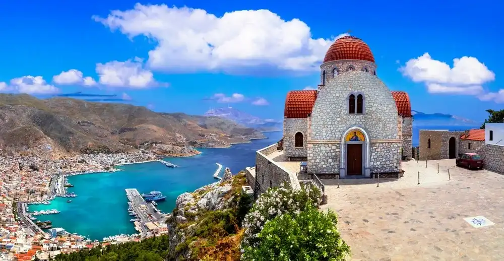 Greece travel- beautiful Kalymnos island, Dodecanese. view of town and agios Savvas monastery Greece travel- beautiful Kalymnos island, Dodecanese. view of town and agios Savvas monastery