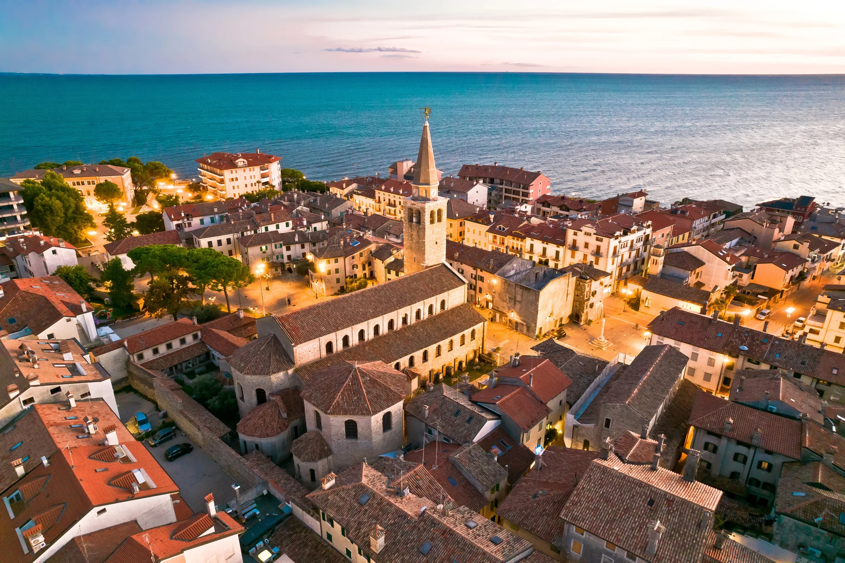 Town of Grado church and waterfront aerial evening view, Friuli-Venezia Giulia region of Italy