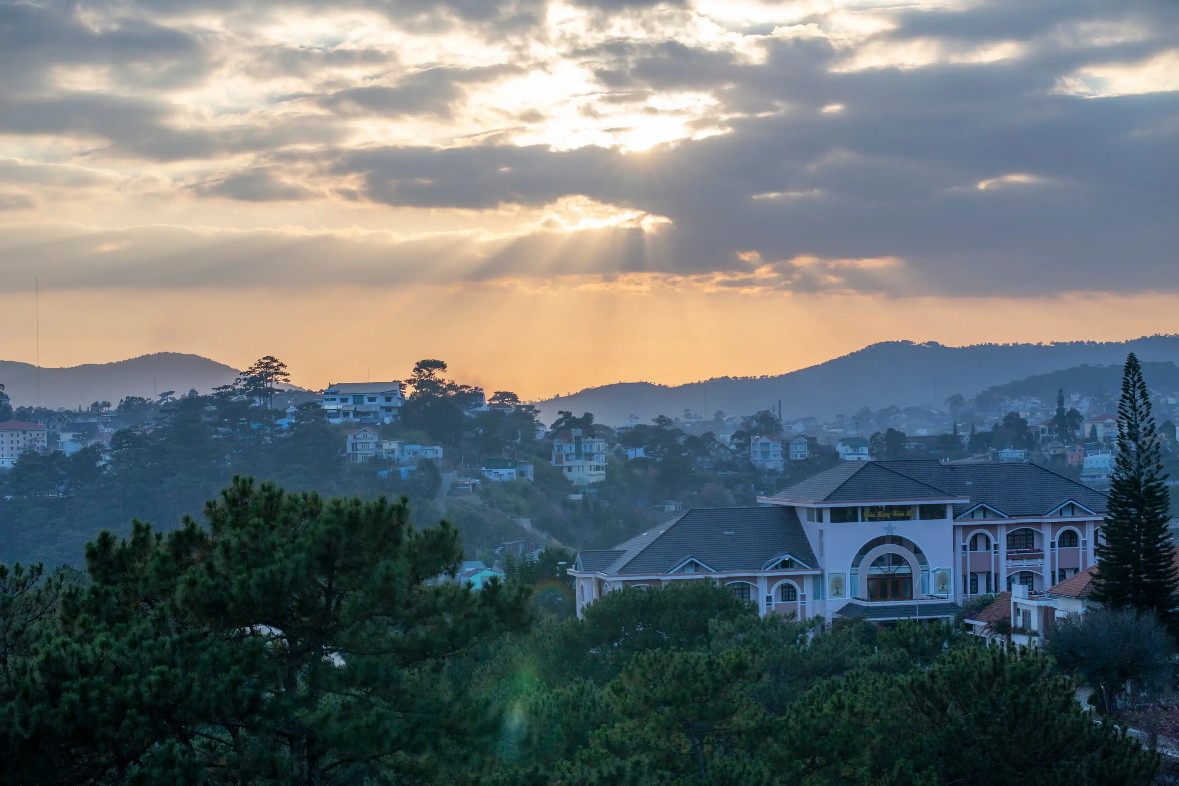Dalat, Vietnam - November 19th 2019: Sunset red sky and villa houses at DaLat city, Vietnam. Dalat is the capital of Lâm Đồng Province in Vietnam. Dalat, Vietnam - November 19th 2019: Sunset red sky and villa houses at DaLat city, Vietnam. Dalat is the capital of Lâm Đồng Province in Vietnam.