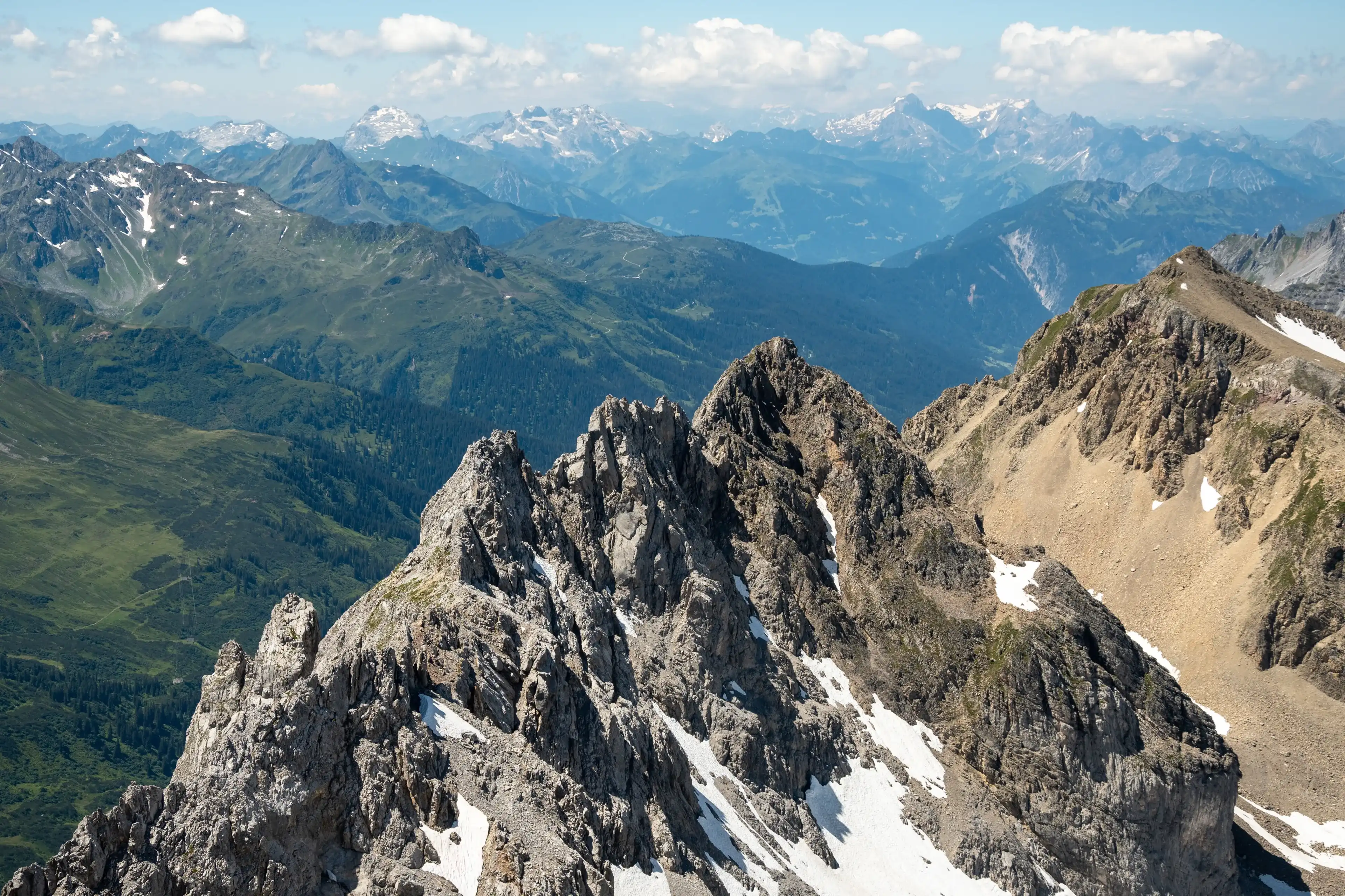 Austrian Alps. View from Valluga mountain in St Anton am Arlberg, in summer. Austrian Alps. View from Valluga mountain in St Anton am Arlberg, in summer.