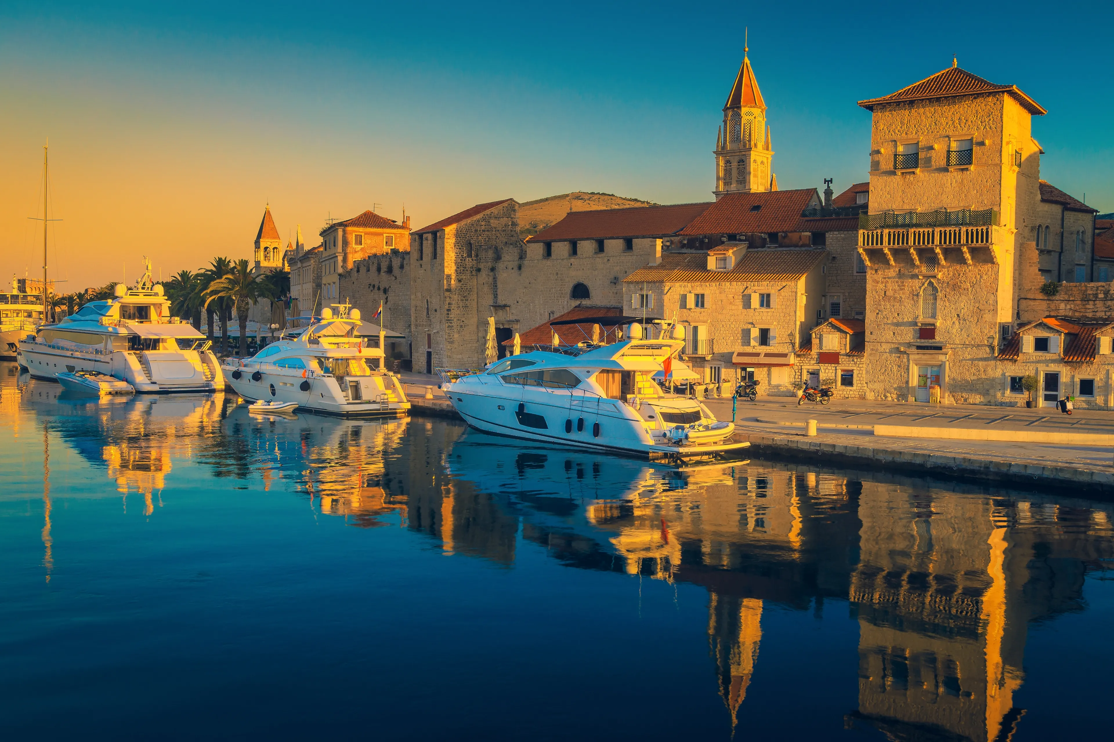 Admirable promenade in the touristic harbor with yachts, boats and spectacular medieval buildings, Trogir old town, Dalmatia, Croatia, Europe