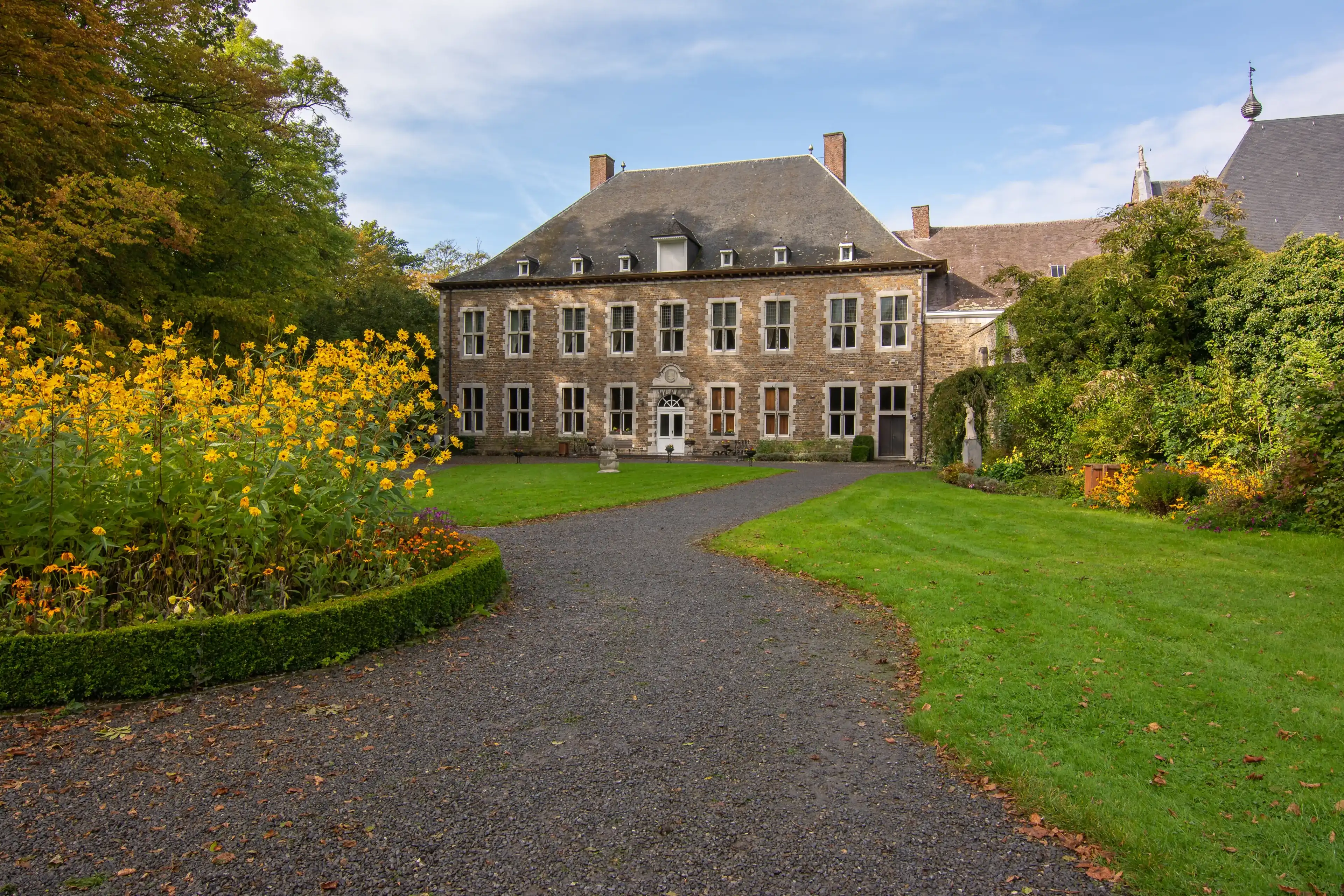 AUBEL, BELGIUM-October 15, 2021: Abbey of Val-Dieu. Founded in 1216. Nowadays a religious community and a touristic site. AUBEL, BELGIUM-October 15, 2021: Abbey of Val-Dieu. Founded in 1216. Nowadays a religious community and a touristic site.