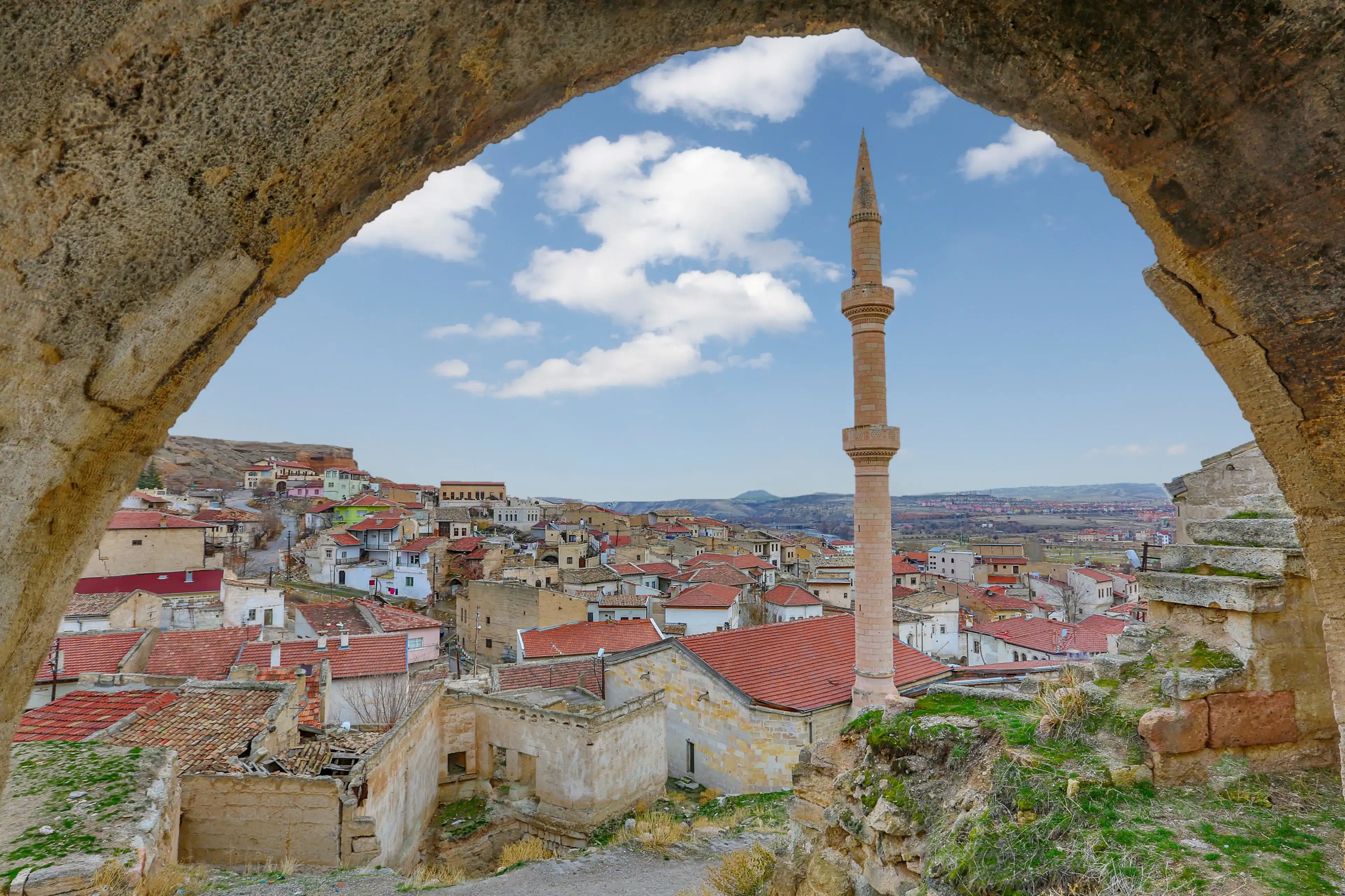 Ancient town of Avanos through a cave in Cappadocia, Turkey Ancient town of Avanos through a cave in Cappadocia, Turkey