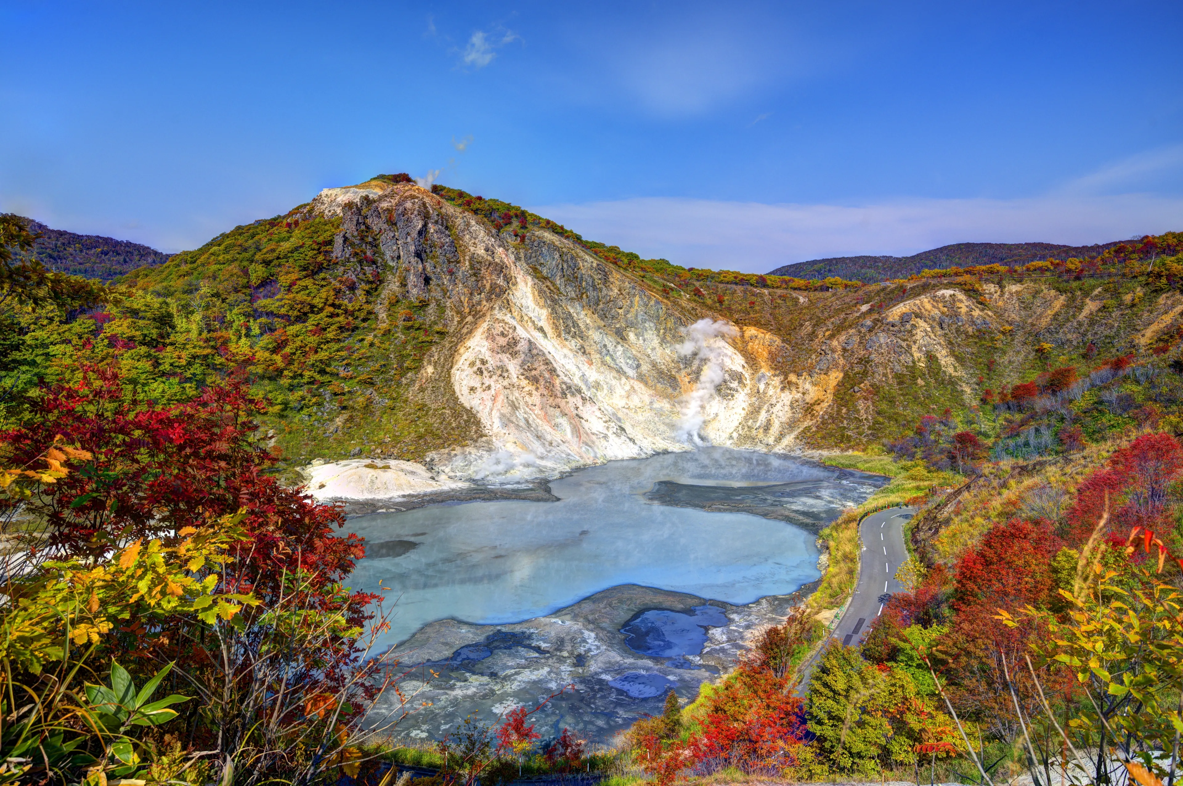 Lake Oyunuma in Noboribetsu, Hokkaido, Japan. THe water is sulfurous with surface temperatures reaching 50 degrees celsius.