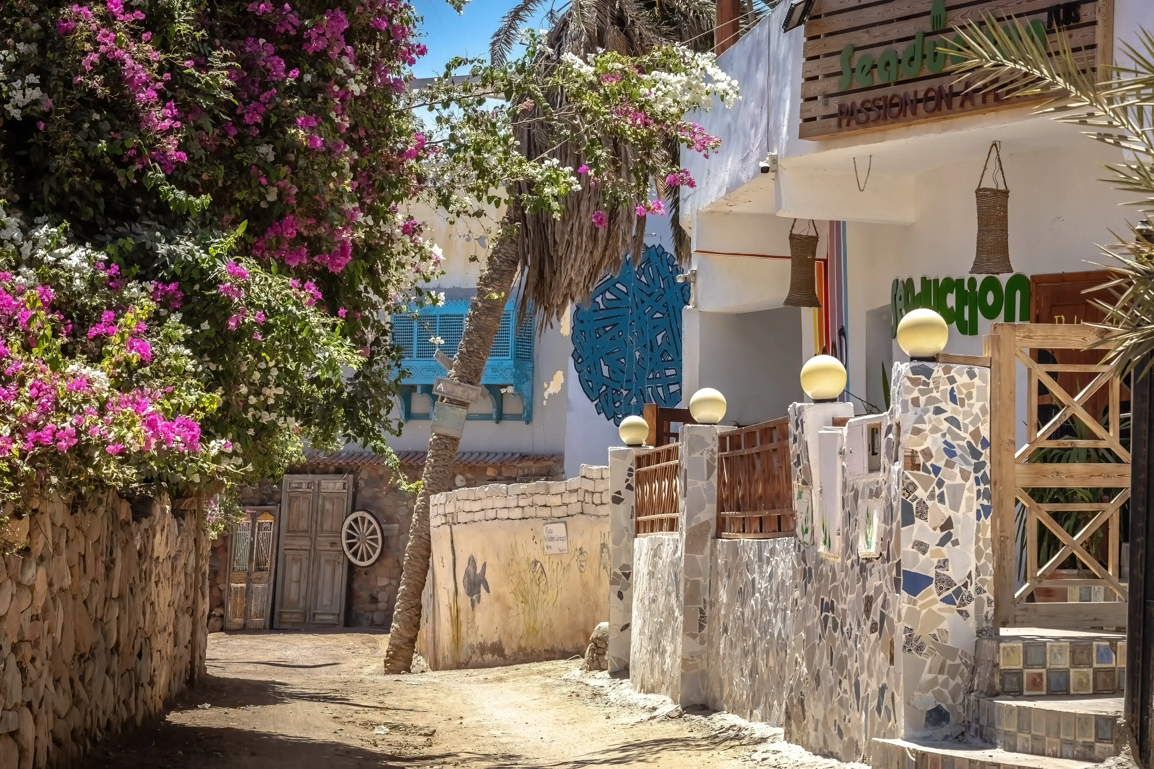 DAHAB, EGYPT - November 12,2023: Dahab Assala area, narrow street, shops and cafes Egypt DAHAB, EGYPT - November 12,2023: Dahab Assala area, narrow street, shops and cafes Egypt