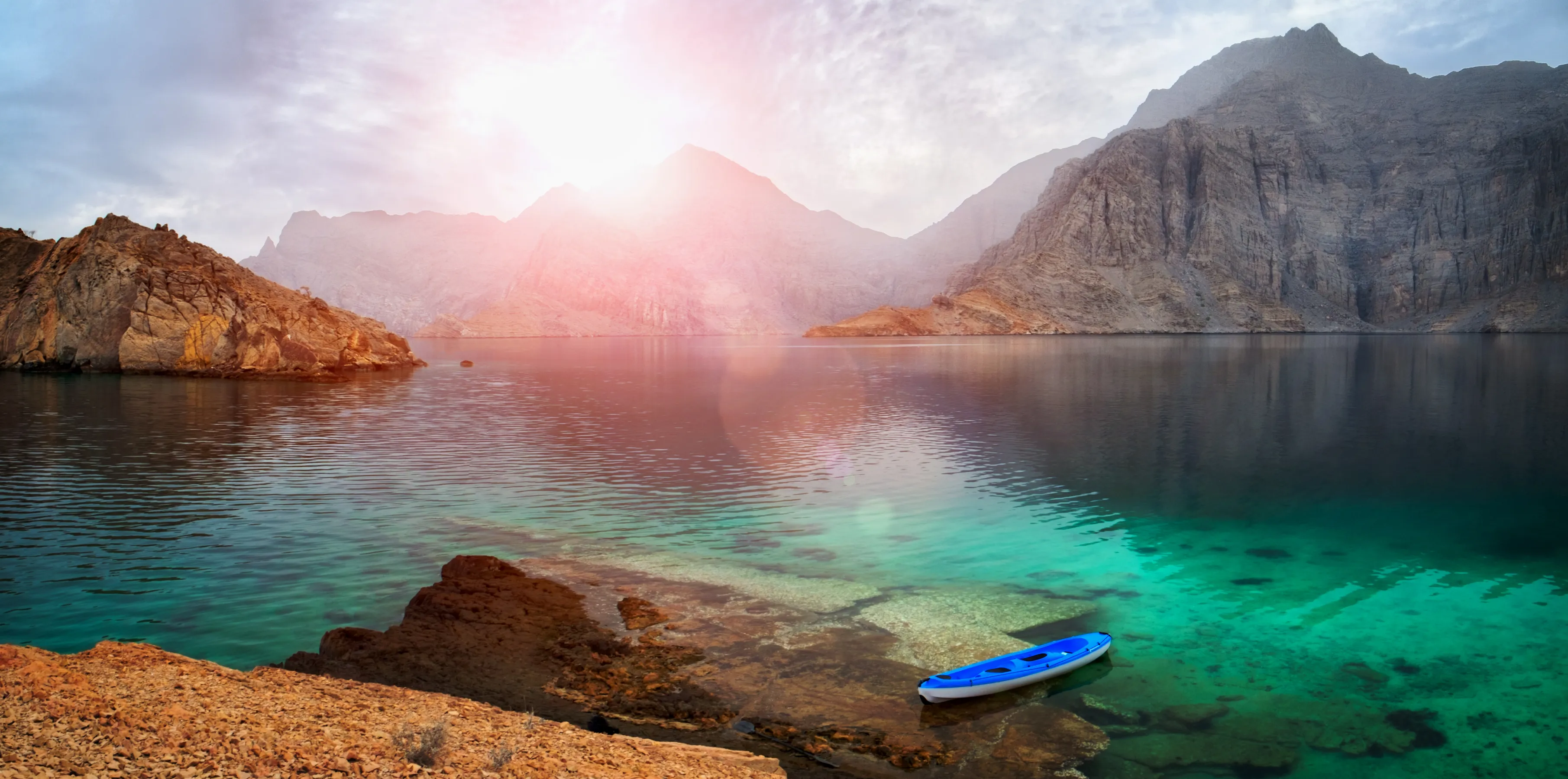 Sea tropical landscape with mountains and fjords, Oman. Vacation recreation holiday travel adventure concept.