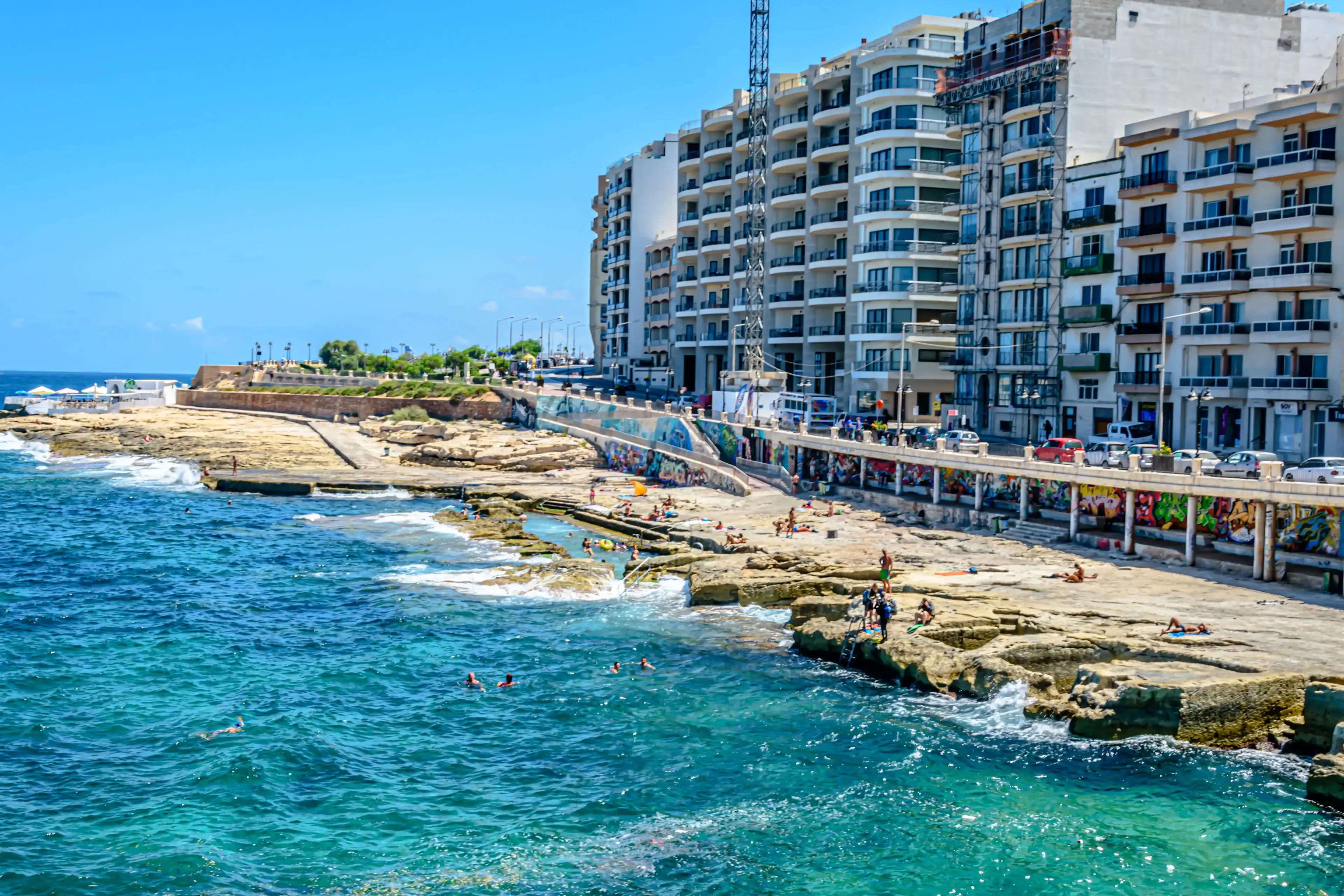Sliema, Malta - August 14 2017: Sliema Beach Sliema, Malta - August 14 2017: Sliema Beach
