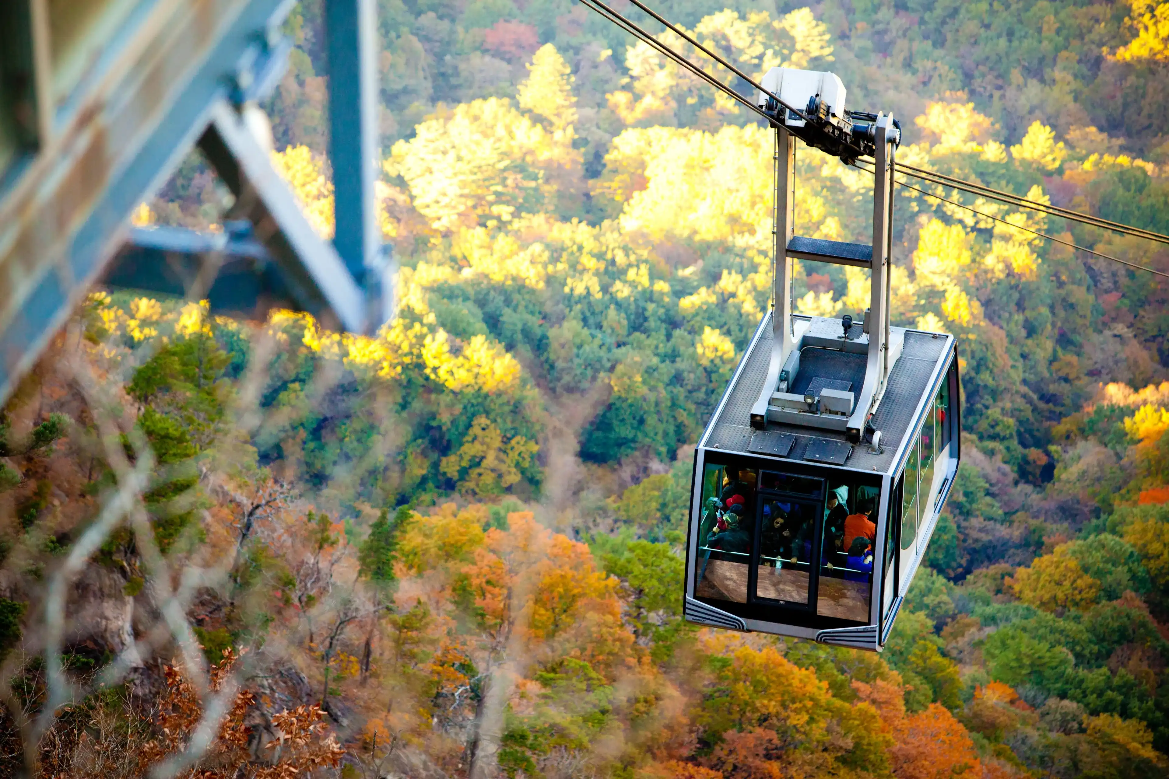 SOKCHO, SOUTH KOREA - October 30, 2011: Cable car is approaching to the Seoraksan Summit Station. SOKCHO, SOUTH KOREA - October 30, 2011: Cable car is approaching to the Seoraksan Summit Station.