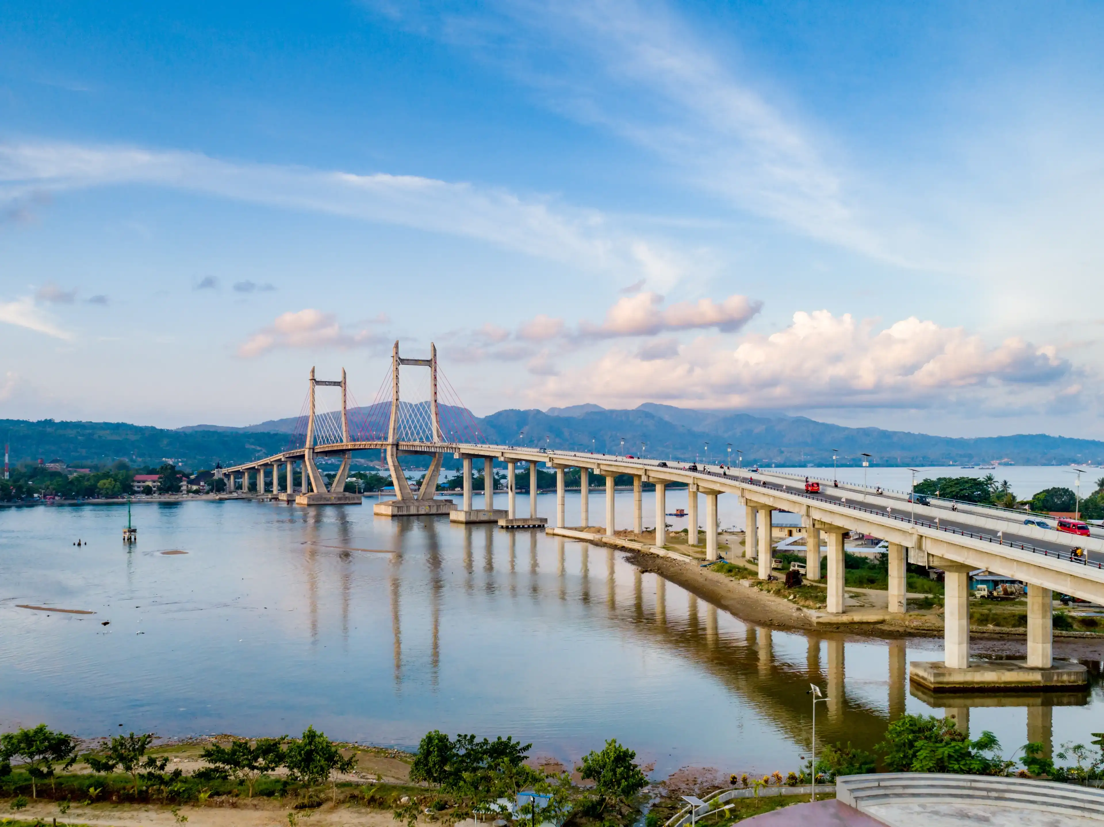 Scenic Aerial View of Iconic Merah Putih Cable Stayed Bridge accross Ambon Bay, Maluku, Indonesia Scenic Aerial View of Iconic Merah Putih Cable Stayed Bridge accross Ambon Bay, Maluku, Indonesia