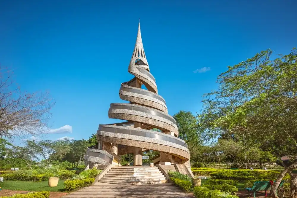 Yaoundé, Centre, Cameroon - March 24th 2023: Beatifull front view on the monument of the reunification of Cameroon on a sunny day, in the very heart of Yaoundé - Cameroon. Yaoundé, Centre, Cameroon - March 24th 2023: Beatifull front view on the monument of the reunification of Cameroon on a sunny day, in the very heart of Yaoundé - Cameroon.