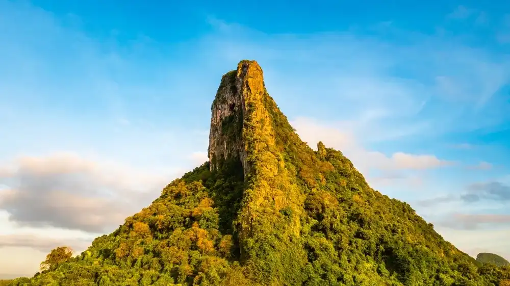Mountain of Phatthalung city, view from above in the morning with golden sun light. Aerial view panorama of Khao Ok Thalu ,Phatthalung, Thailand. Mountain of Phatthalung city, view from above in the morning with golden sun light. Aerial view panorama of Khao Ok Thalu ,Phatthalung, Thailand.