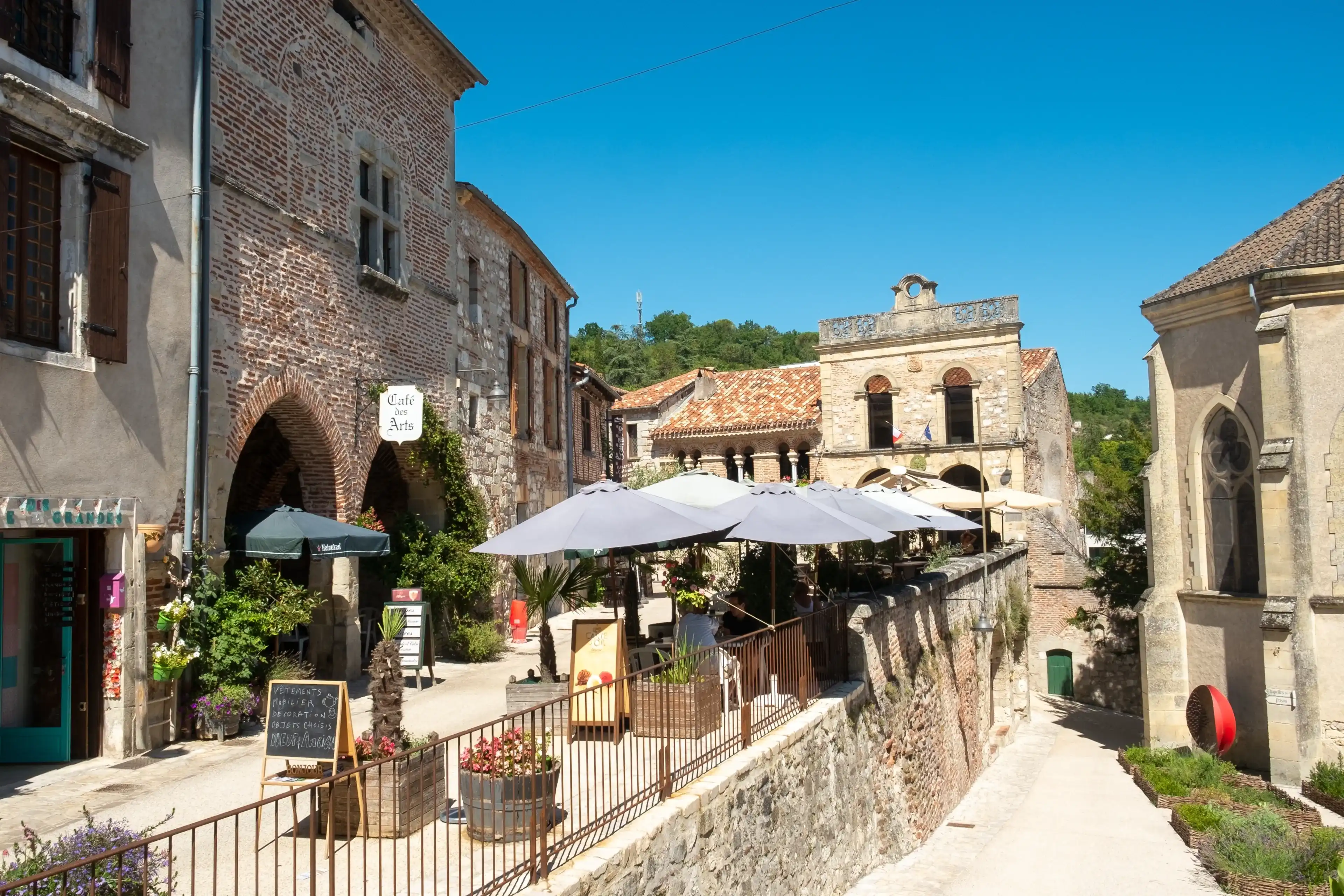 19th July 2019 - Penne d'Agenais, France: There is much traditional architecture for visitors to see in the narrow streets of travel destination Penne d'Agenais, Lot et Garonne, France. 19th July 2019 - Penne d'Agenais, France: There is much traditional architecture for visitors to see in the narrow streets of travel destination Penne d'Agenais, Lot et Garonne, France.