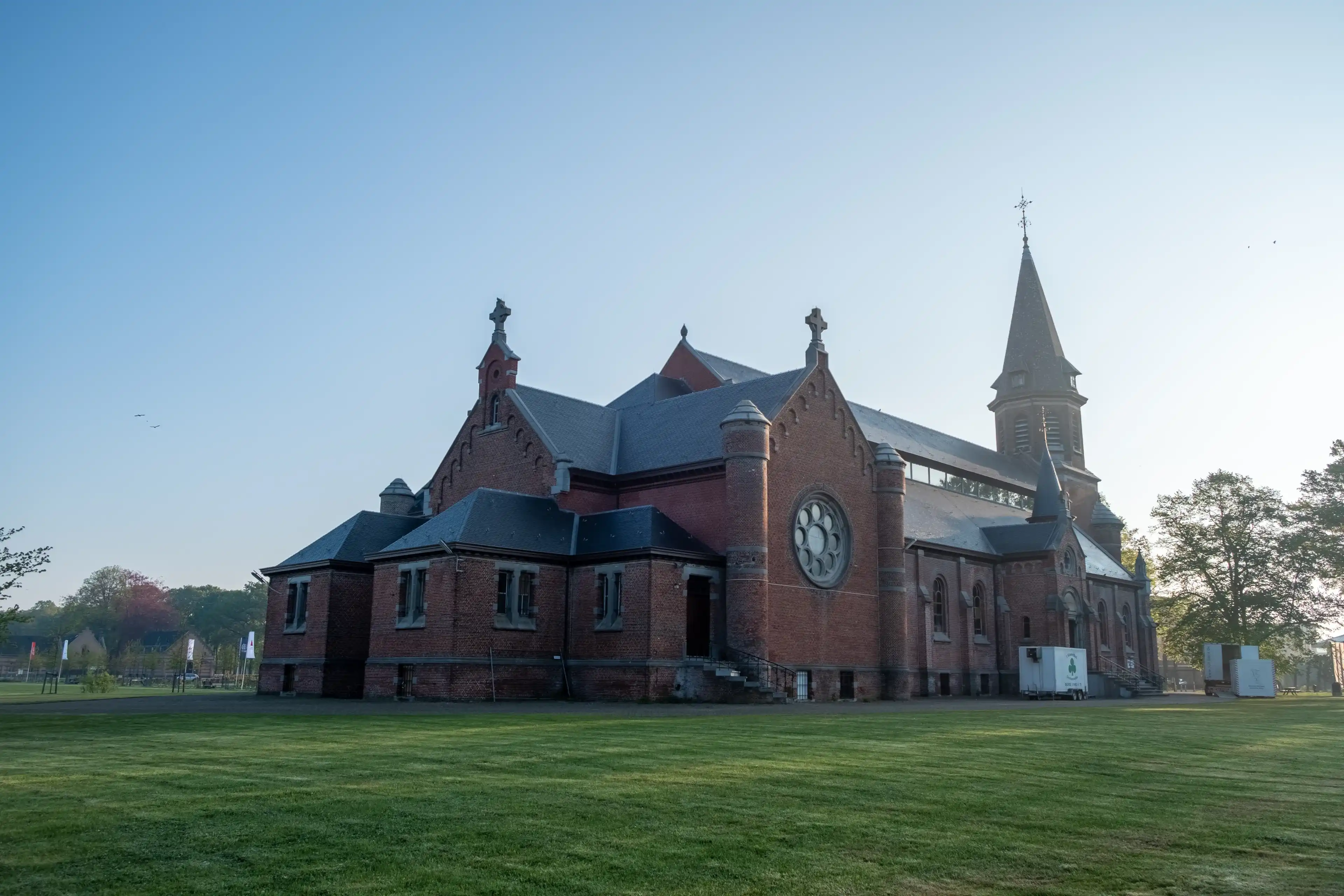 Merksplas, Belgium, April 27th, 2022, The Chapel in Merksplas Colony in the bright sunrise light . High quality photo Merksplas, Belgium, April 27th, 2022, The Chapel in Merksplas Colony in the bright sunrise light . High quality photo