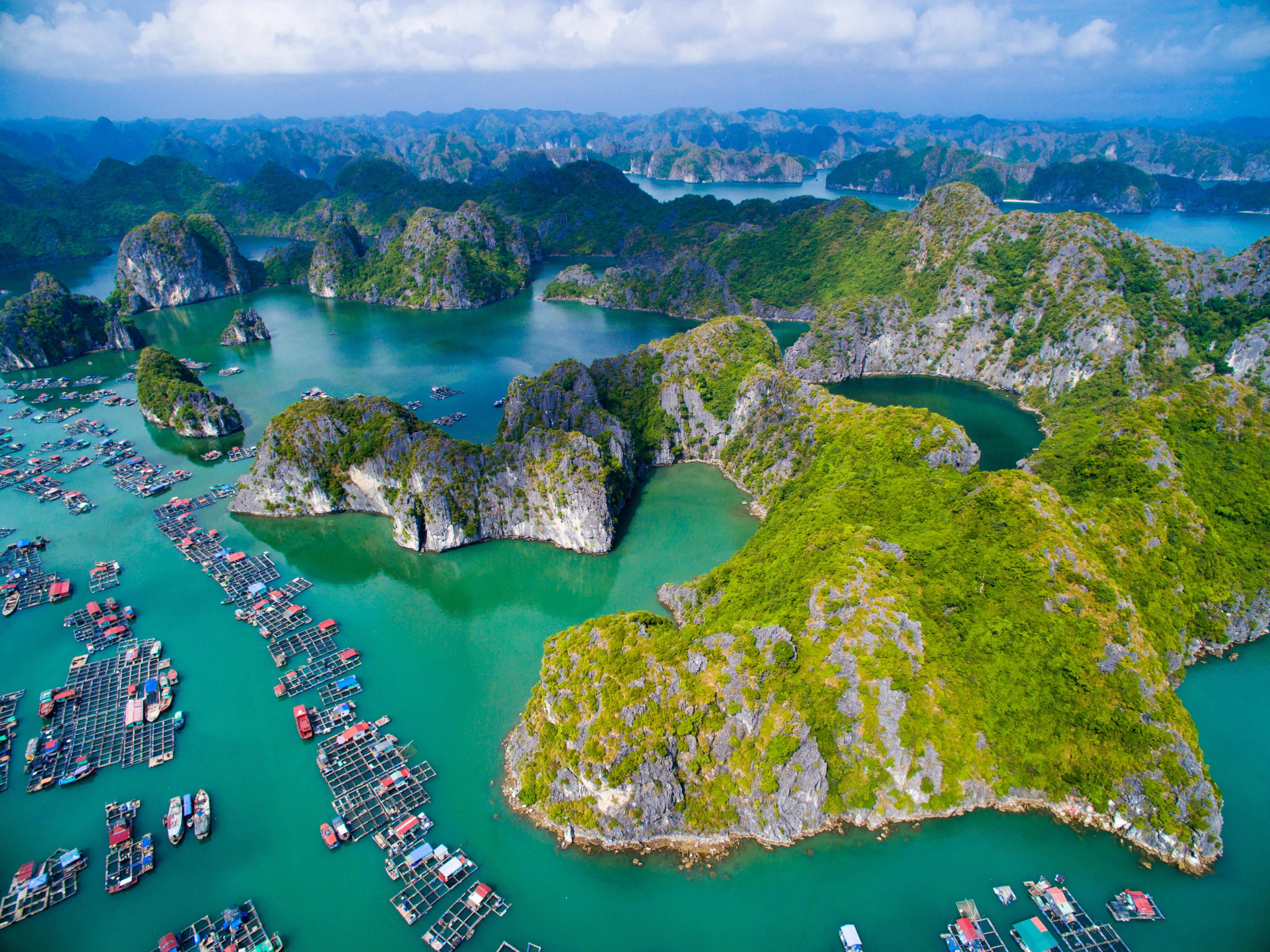 HAIPHONG, VIETNAM, November 8, 2015: Aerial view of floating villages around Cat Ba islands. Cat Ba is the largest of the 366 islands, which make up the southeastern edge of Ha Long Bay in Vietnam. 