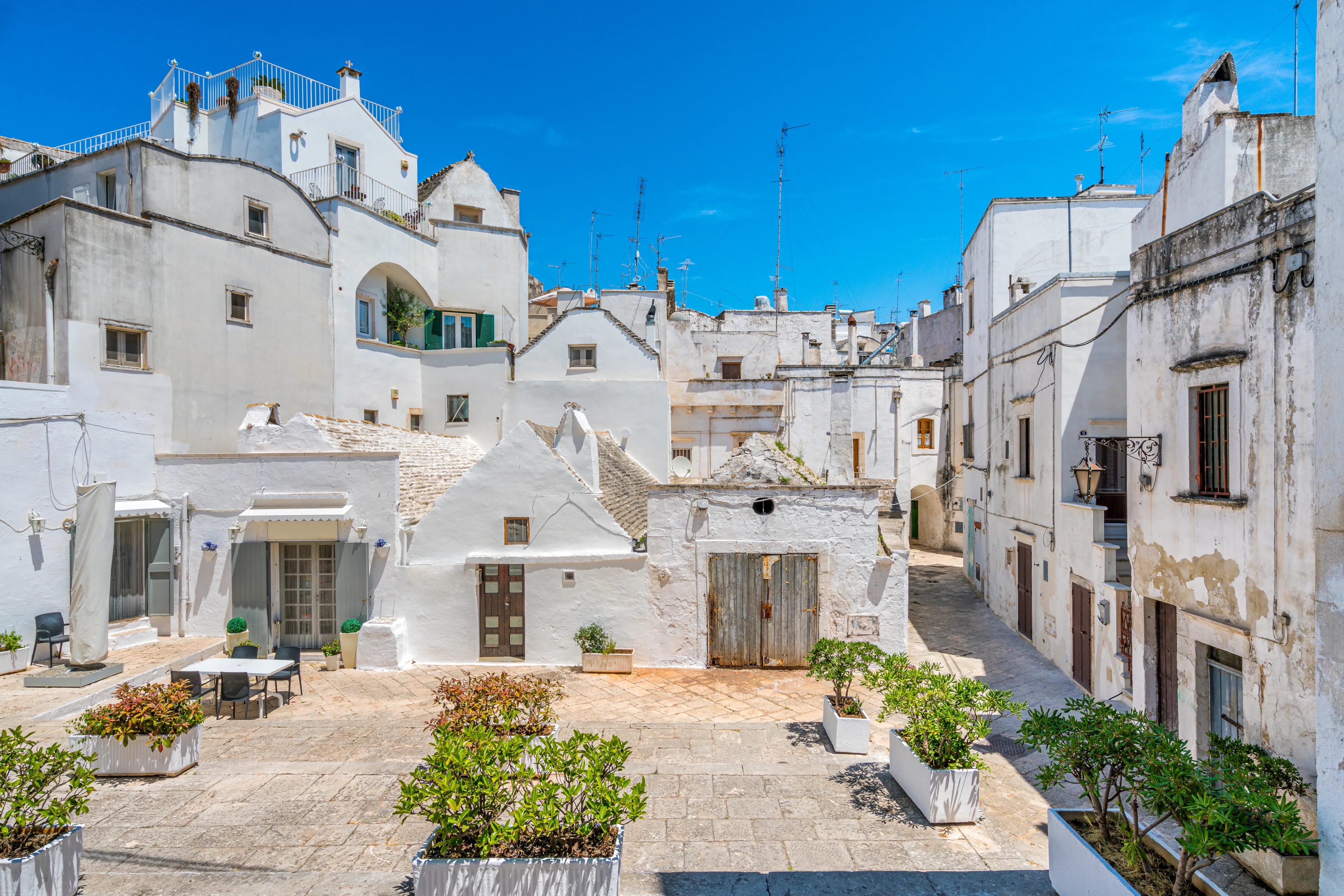 Scenic sight in Martina Franca on a sunny summer morning, province of Taranto, Apulia, southern Italy.