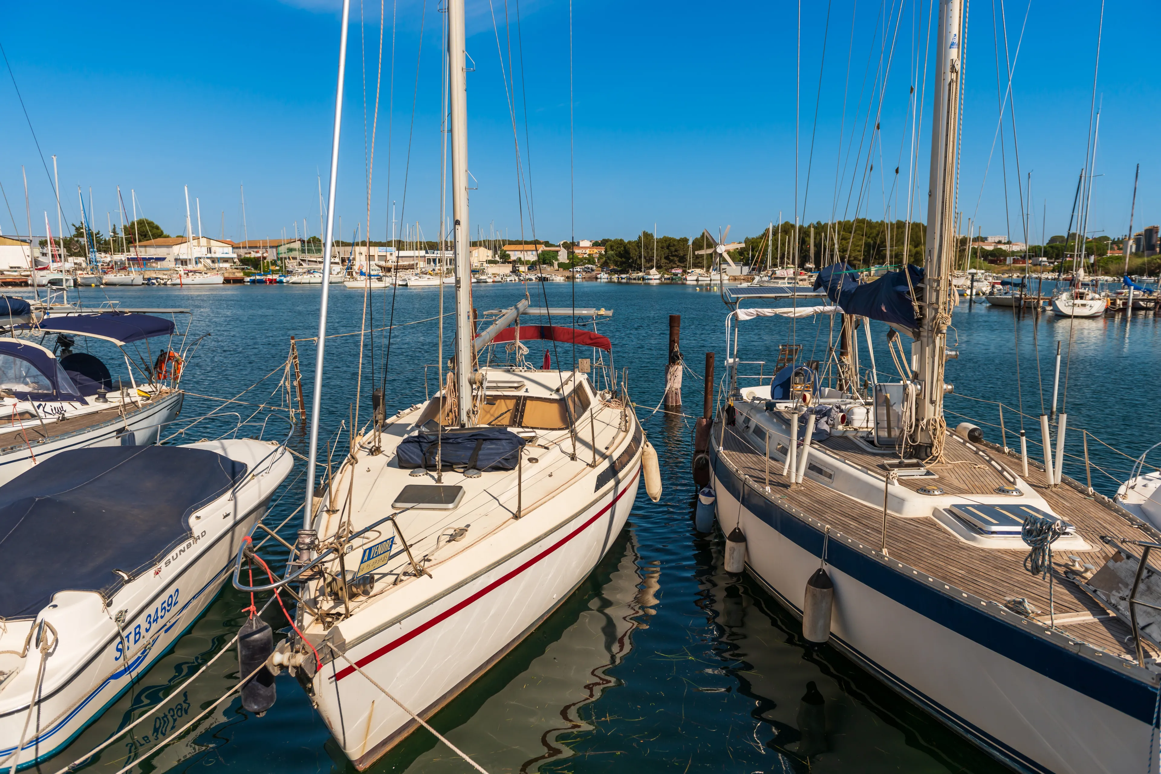 June 14, 2022: Sailboats moored in the marina of Balaruc les Bains, on the pond of Thau, in Occitanie, France