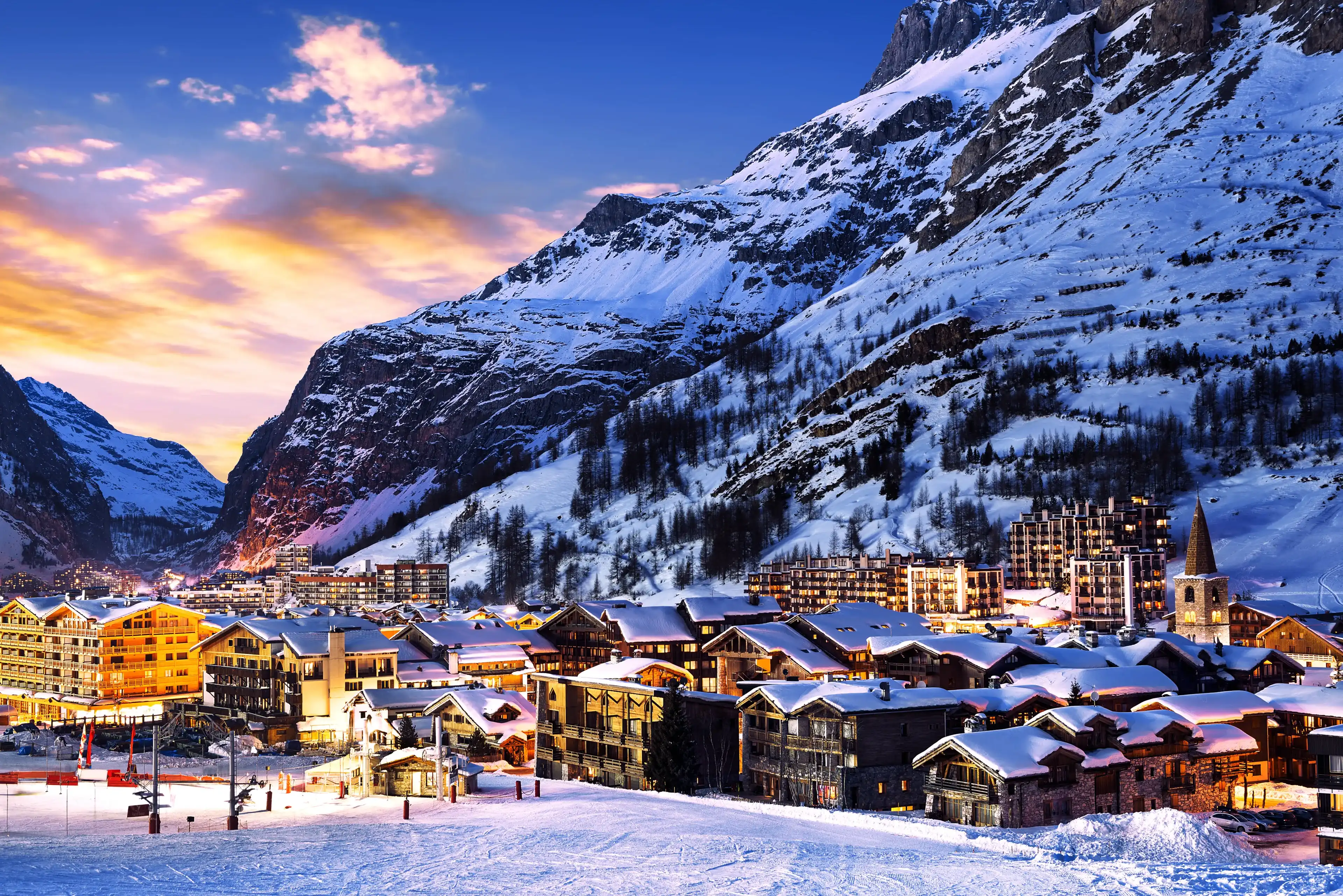 Famous and luxury place of Val d'Isere at sunset, Tarentaise, Alps, France Famous and luxury place of Val d'Isere at sunset, Tarentaise, Alps, France