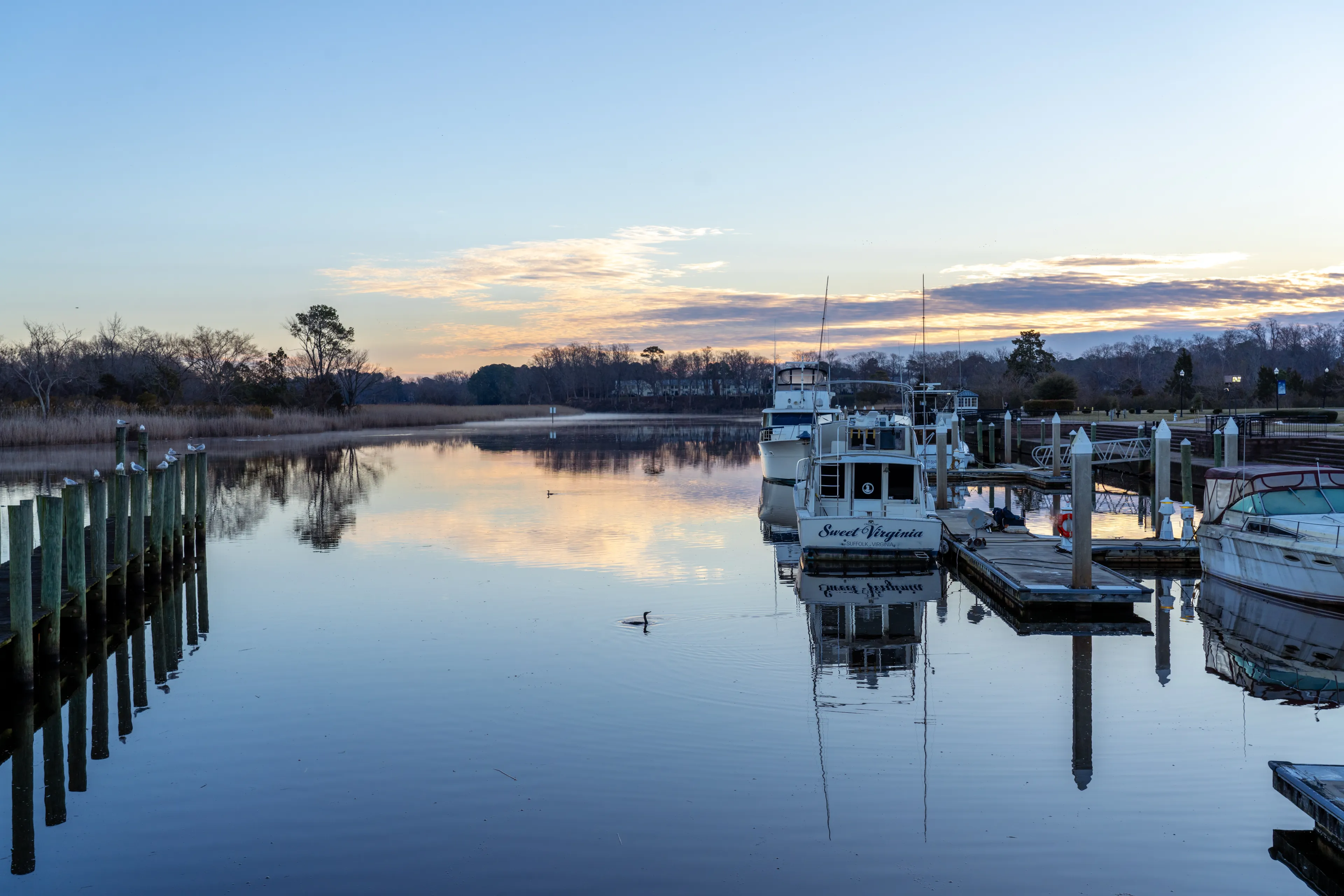 Suffolk Virginia - February 19 2024: Boats Docked on the Nansemond River in Downtown Suffolk Virginia