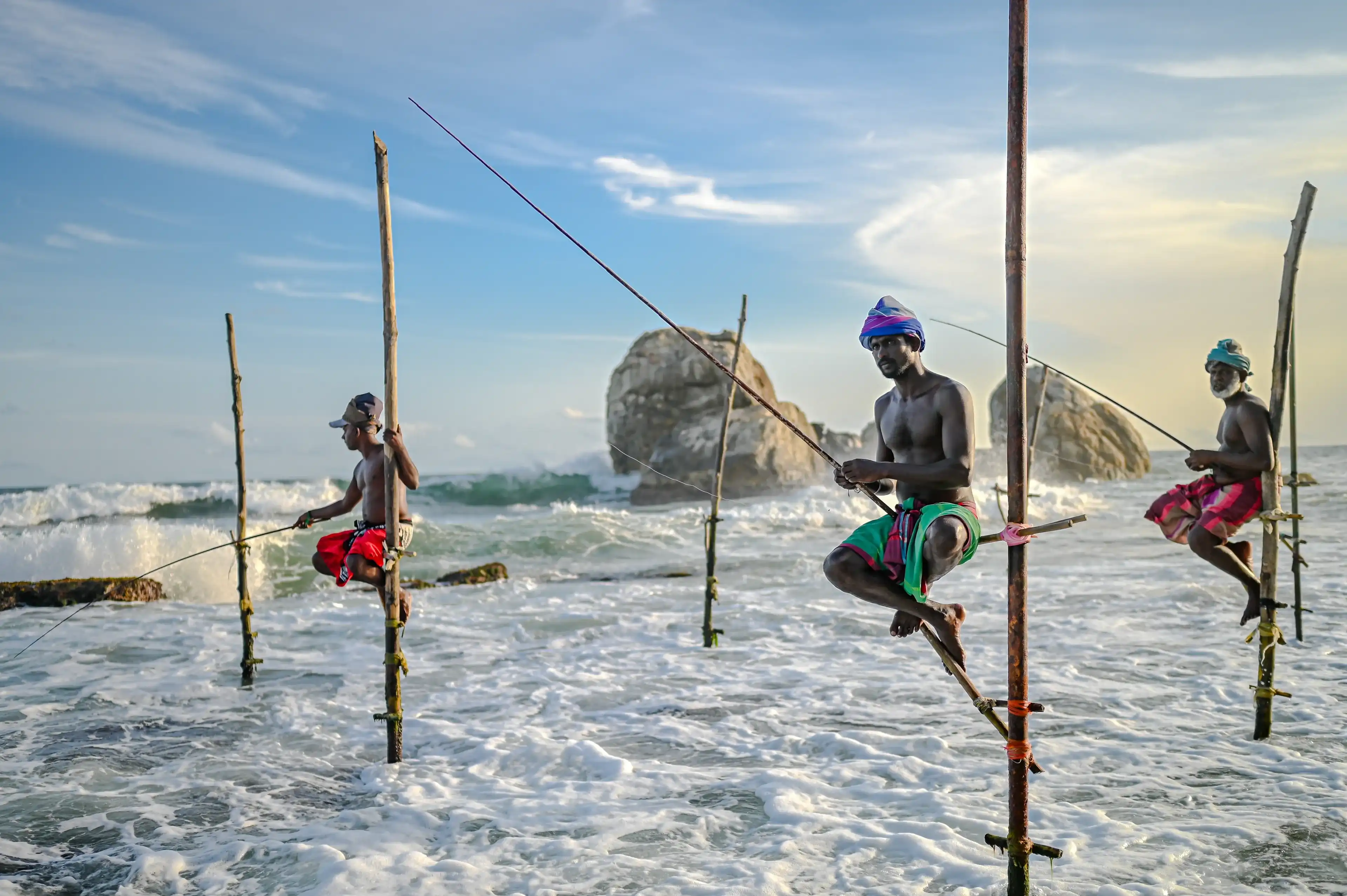Koggala, Sri Lanka- July 24 2024: Stilt Fishing is a traditional style of fishing practised by local fishermen in Sri Lanka, especially on the southern coast. Koggala, Sri Lanka- July 24 2024: Stilt Fishing is a traditional style of fishing practised by local fishermen in Sri Lanka, especially on the southern coast.