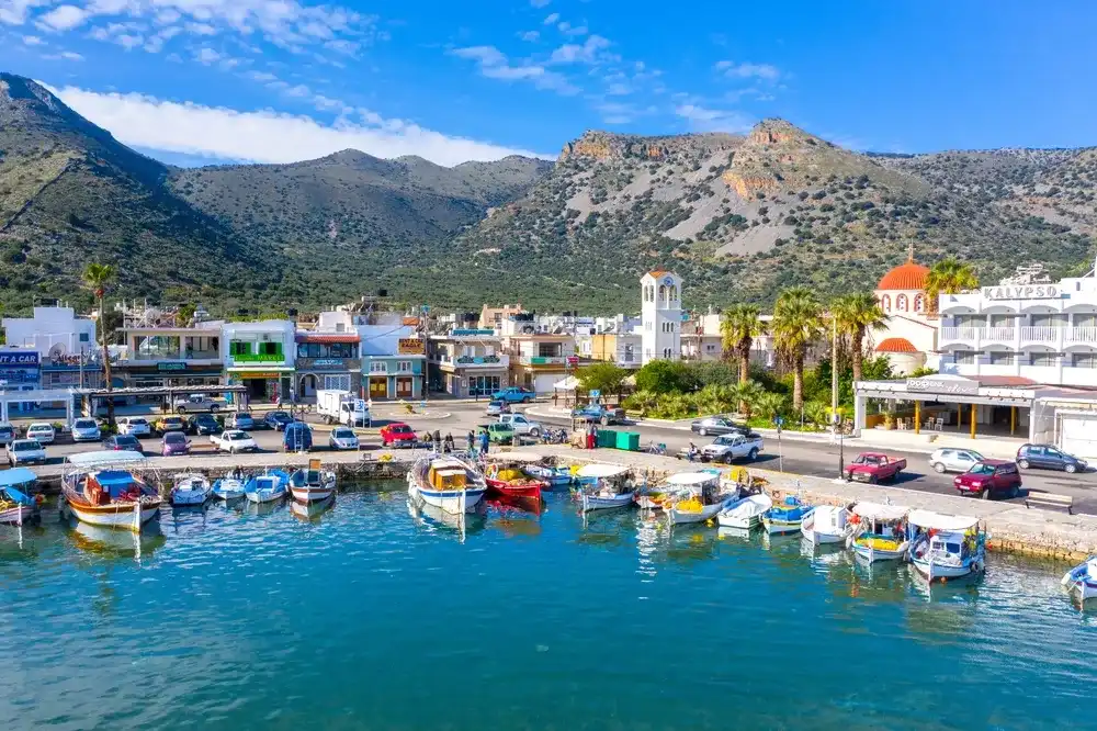 The small traditional harbor of Elounda, Crete, Greece on March 16, 2022 The small traditional harbor of Elounda, Crete, Greece on March 16, 2022