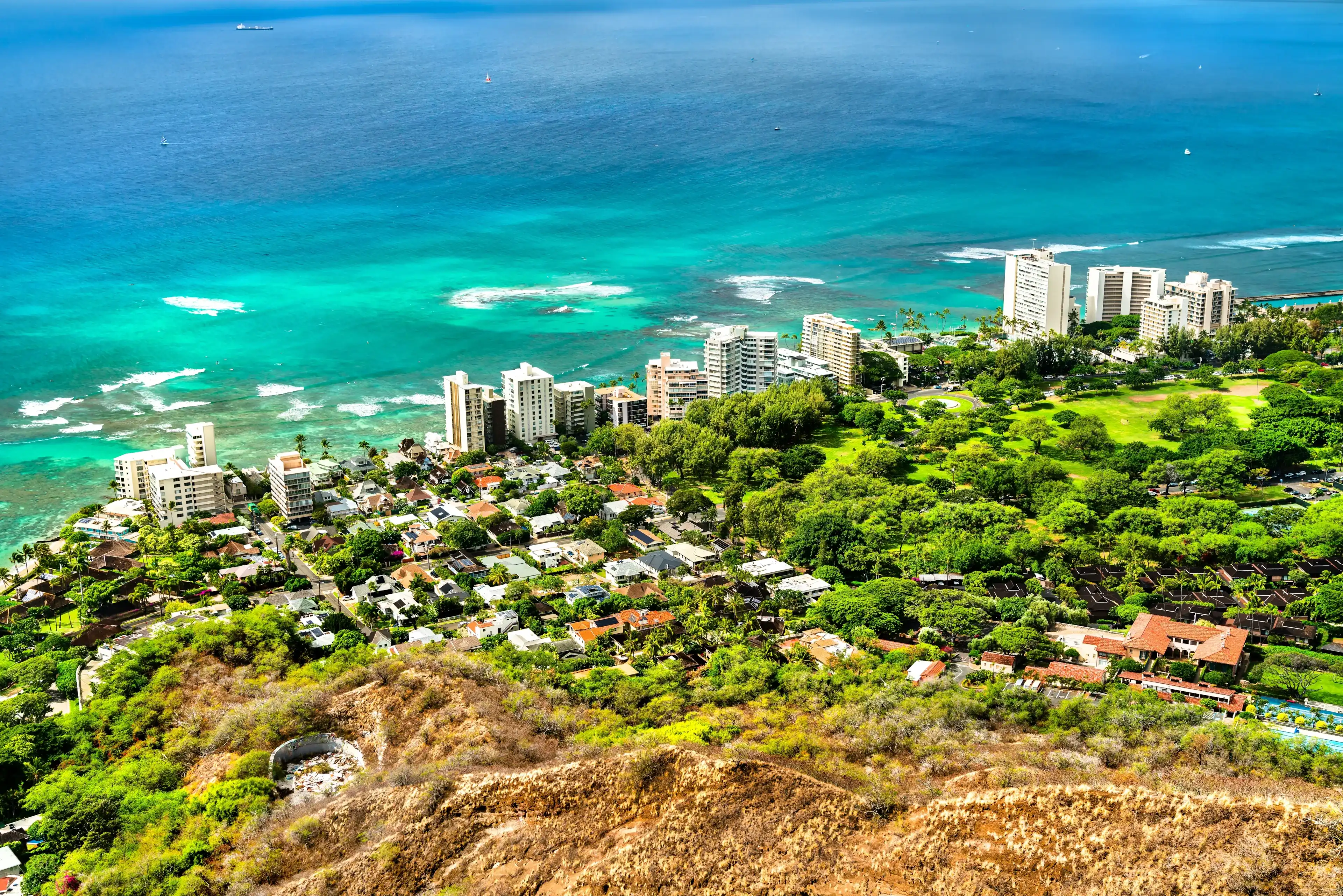 Buildings at the foot of Diamond Head Volcano in Honolulu - Oahu, Hawaii, United States Buildings at the foot of Diamond Head Volcano in Honolulu - Oahu, Hawaii, United States