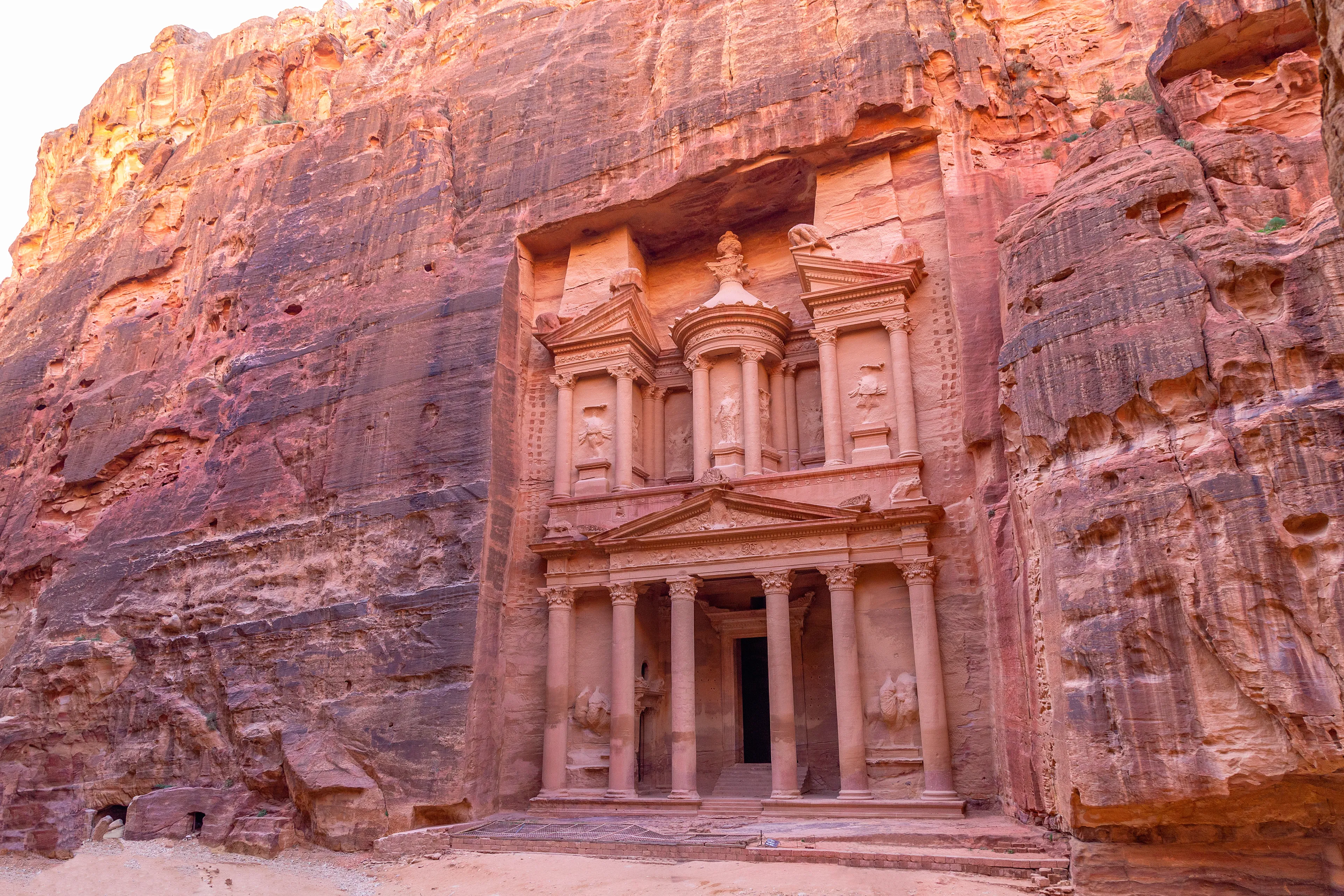 Al Khazneh. It is the treasury in Petra ancient city. Petra is the main attraction of Jordan. Petra is included in the UNESCO heritage list.