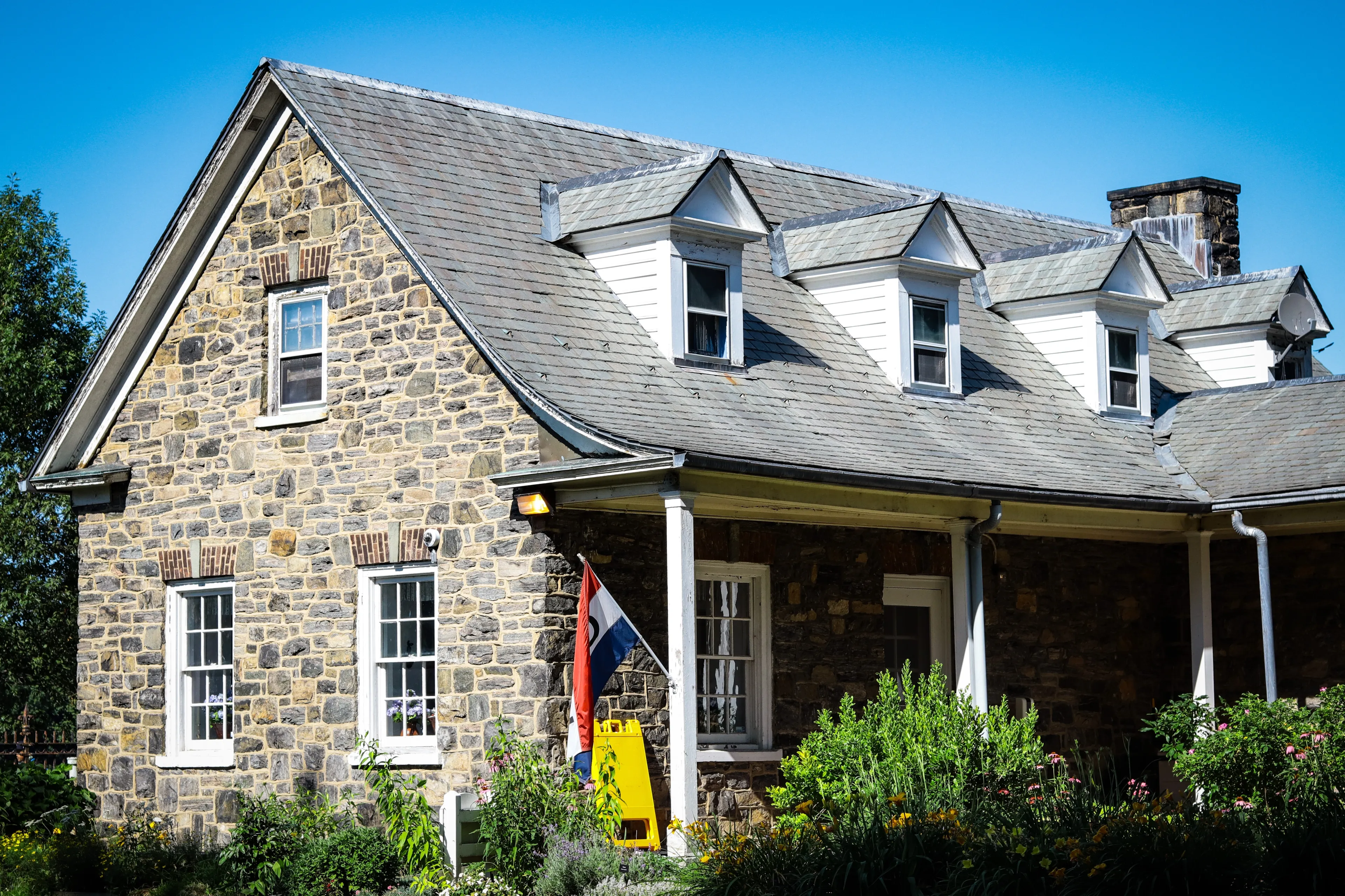 New York City, NY United States - July 3, 2022: The Van Cortlandt House Museum sits in Van Cortlandt Park in the Bronx. Georgian style. Former plantation. Subject of haunted house reports.