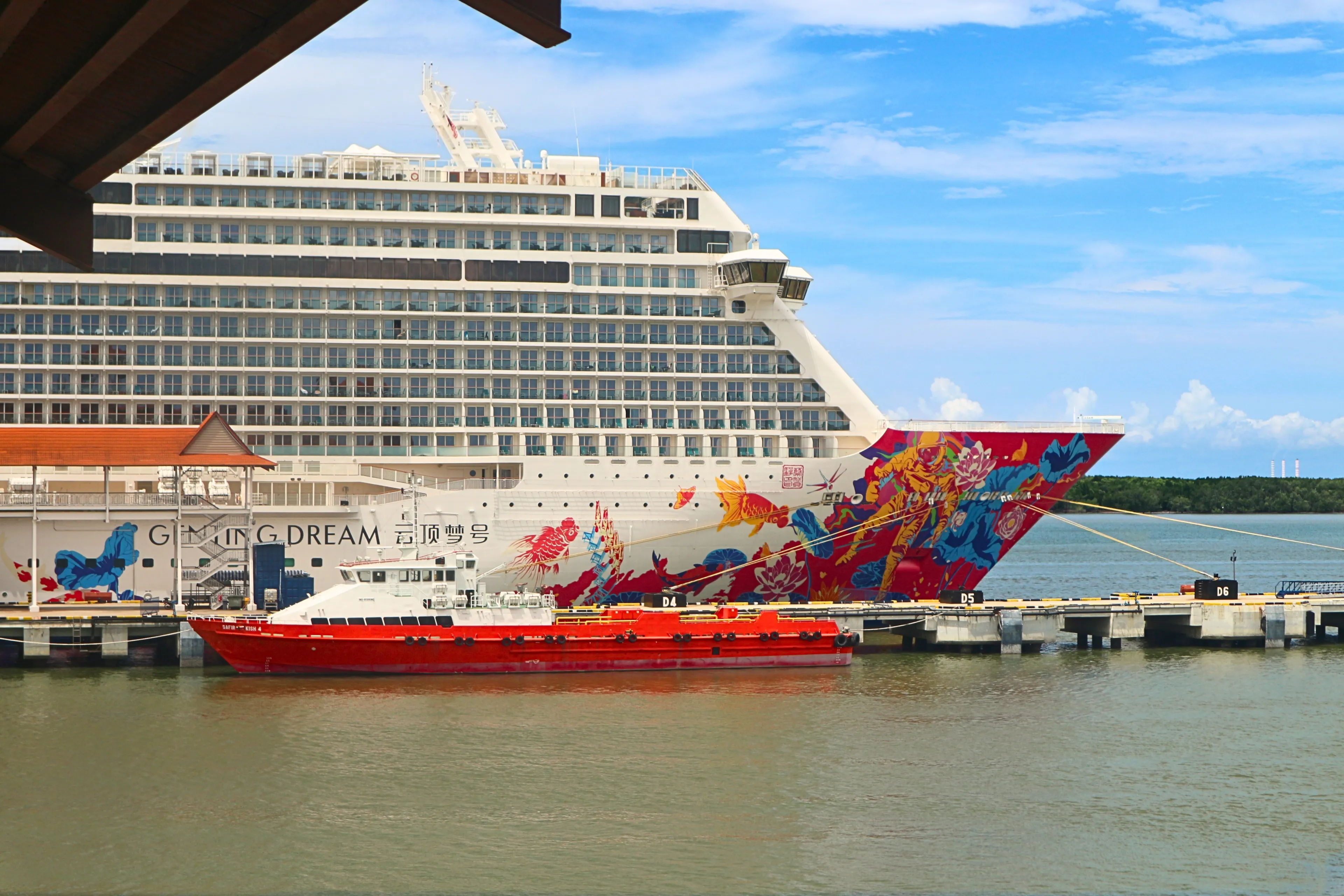 Port Klang, Malaysia - November 9th 2023: travel photography of Genting Dream cruise ship docking at Port Klang in Selangor, Malaysia