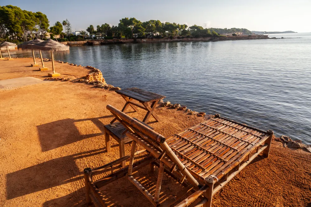 Santa Eularia des Riu, littoral, coastal, distinctive rocks ocher color. Mediterranean view, Ibiza island, Balearic Islands, Spain.