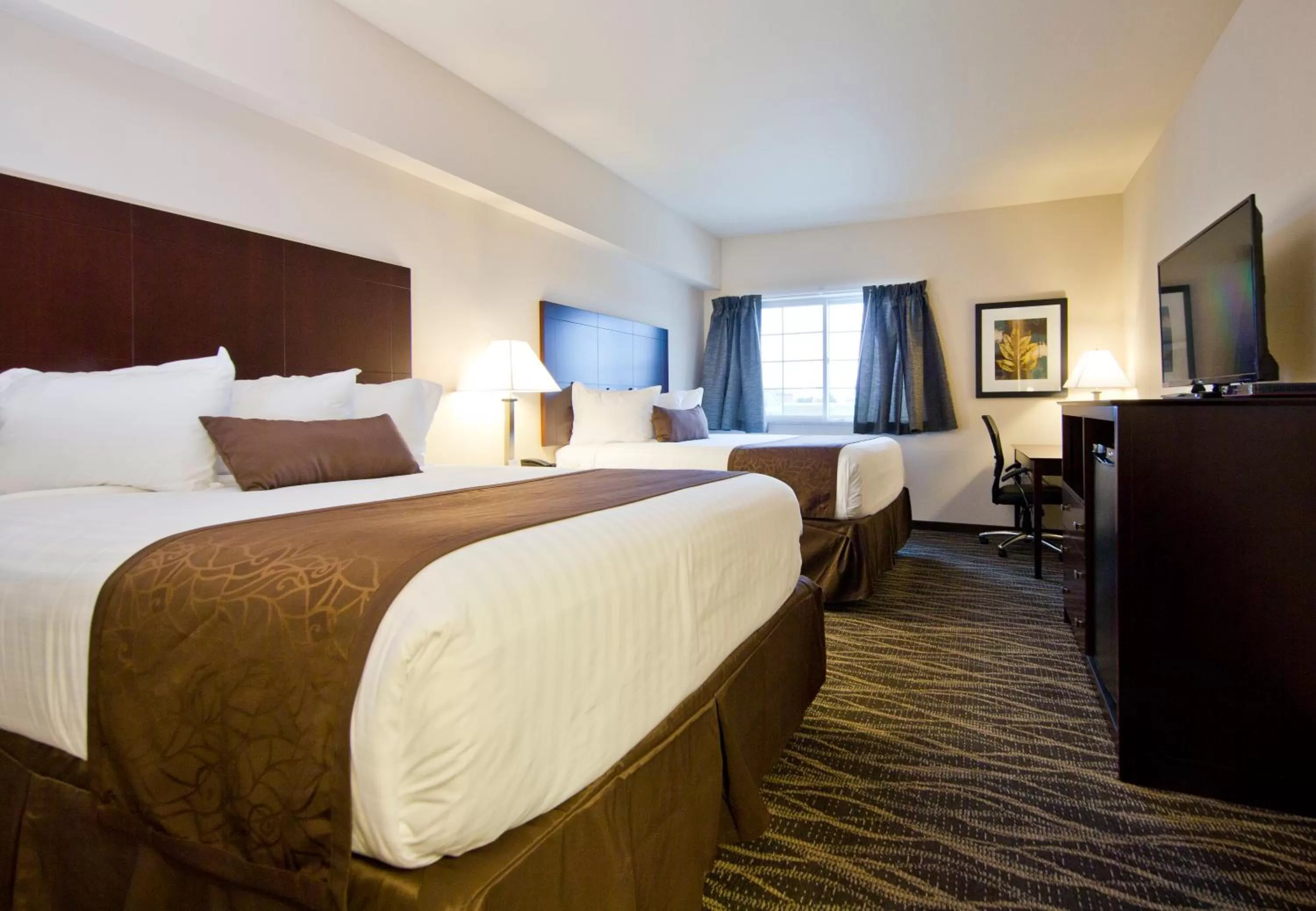 Bed in Cobblestone Inn & Suites - Boone