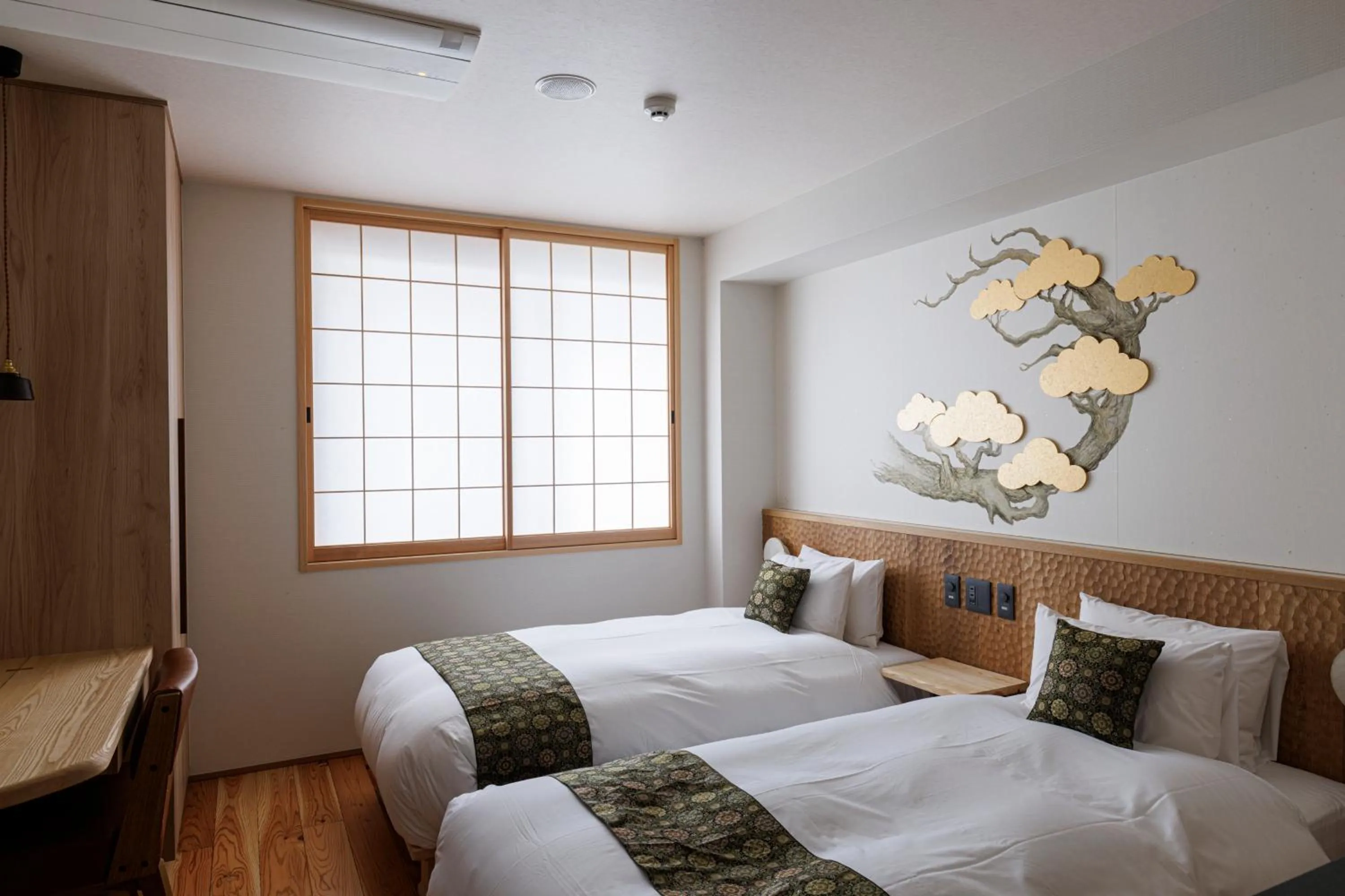 Bed in Hotel Kanazawa Zoushi