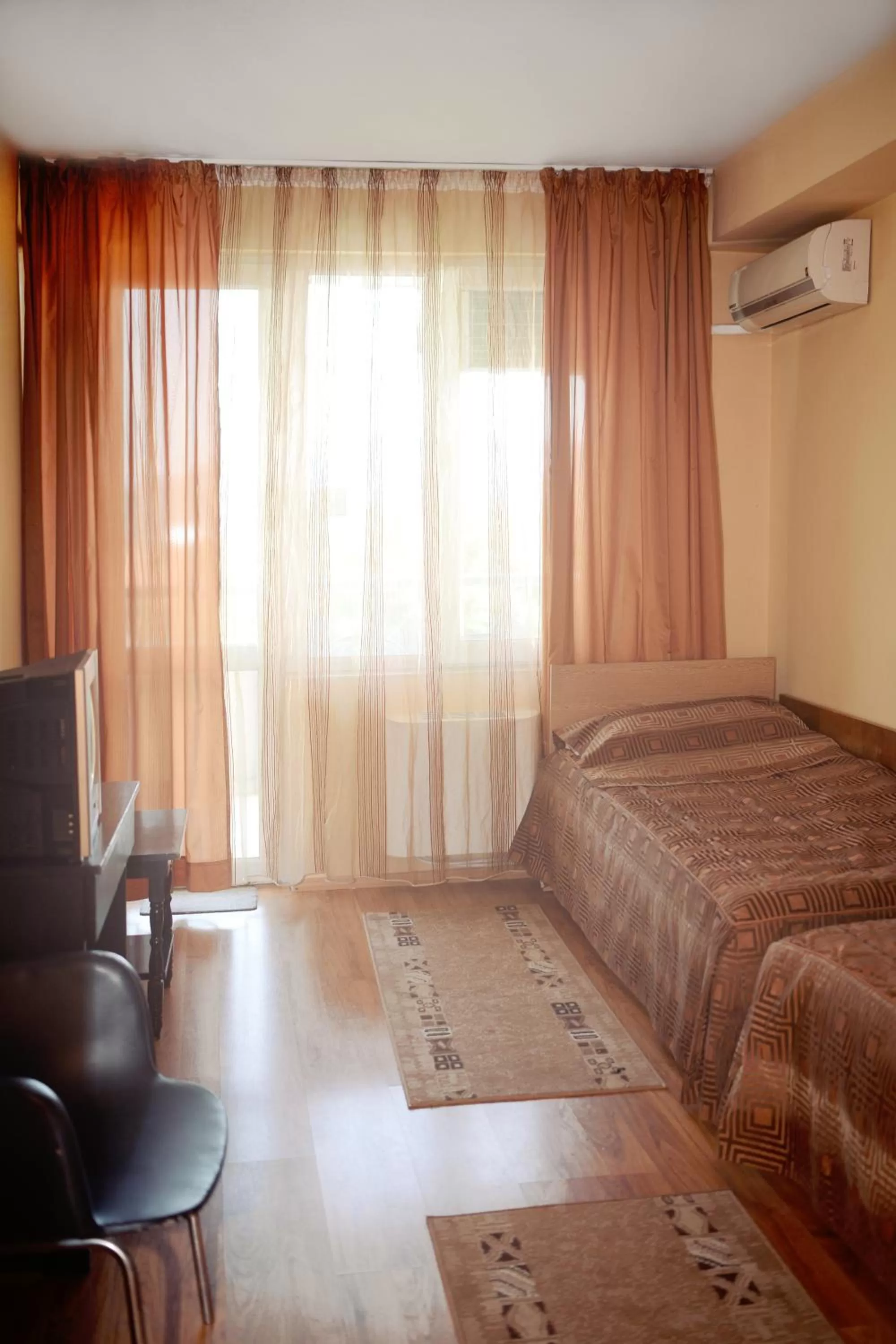 Bed in Family Art-Hotel Zora