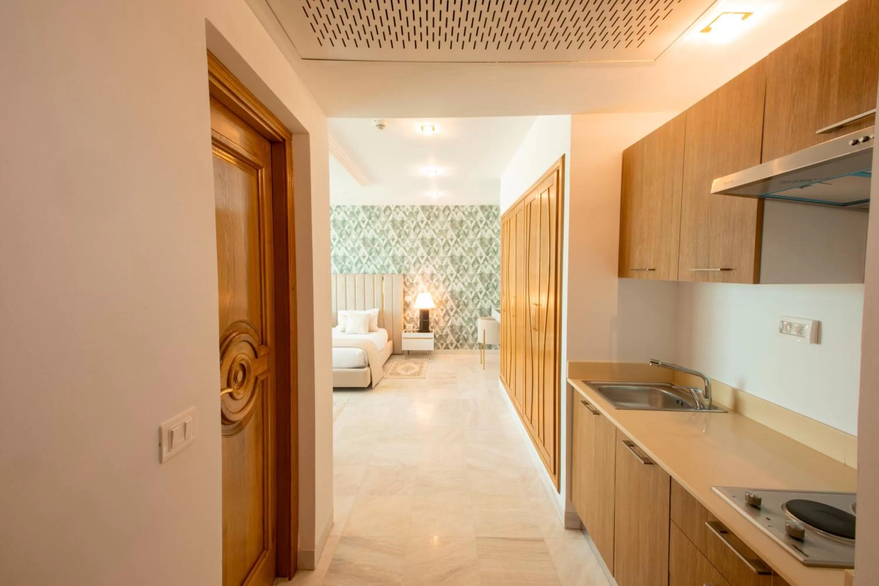 Kitchen or kitchenette in The Penthouse Suites Hotel