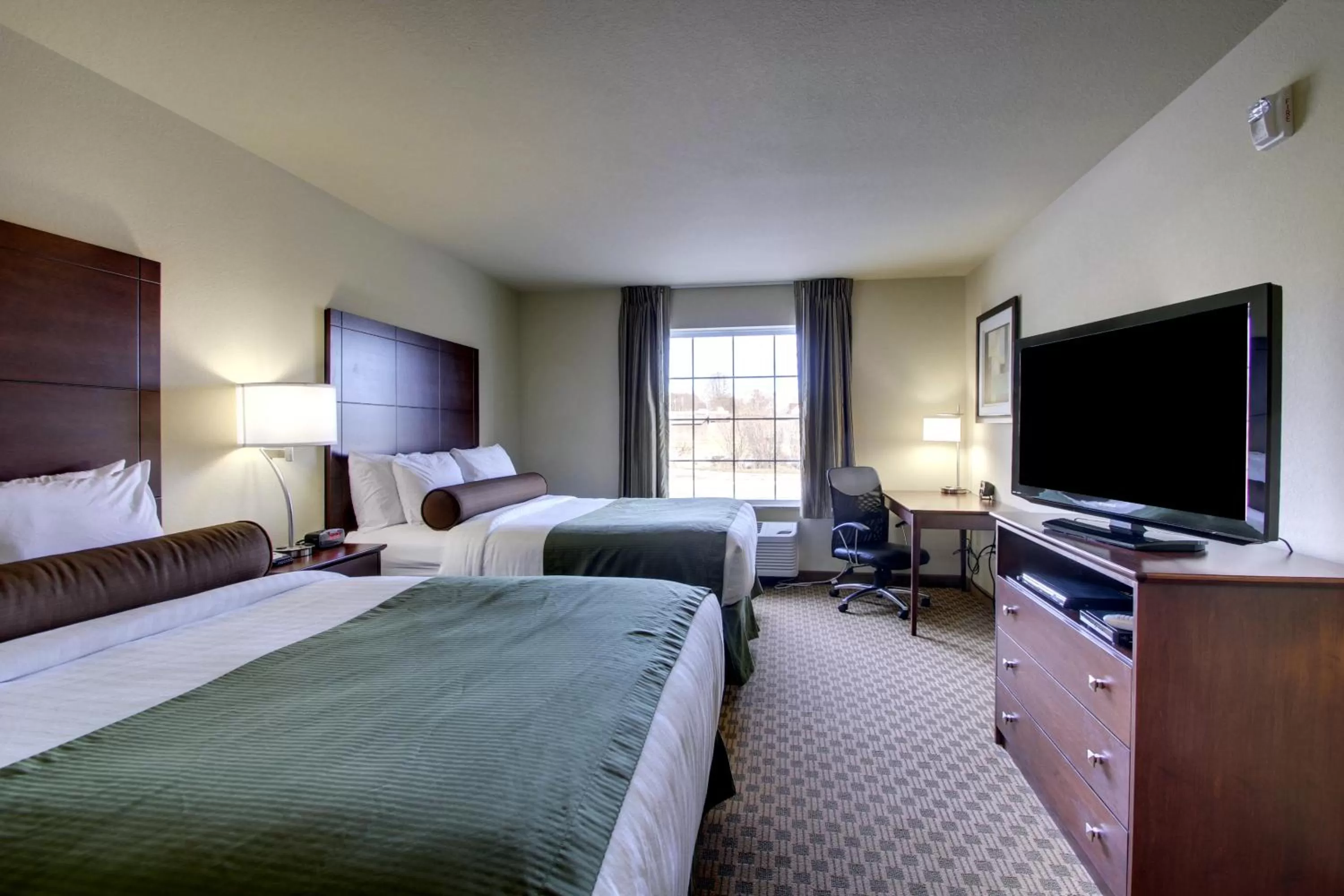 Bed in Cobblestone Inn & Suites - Hartington