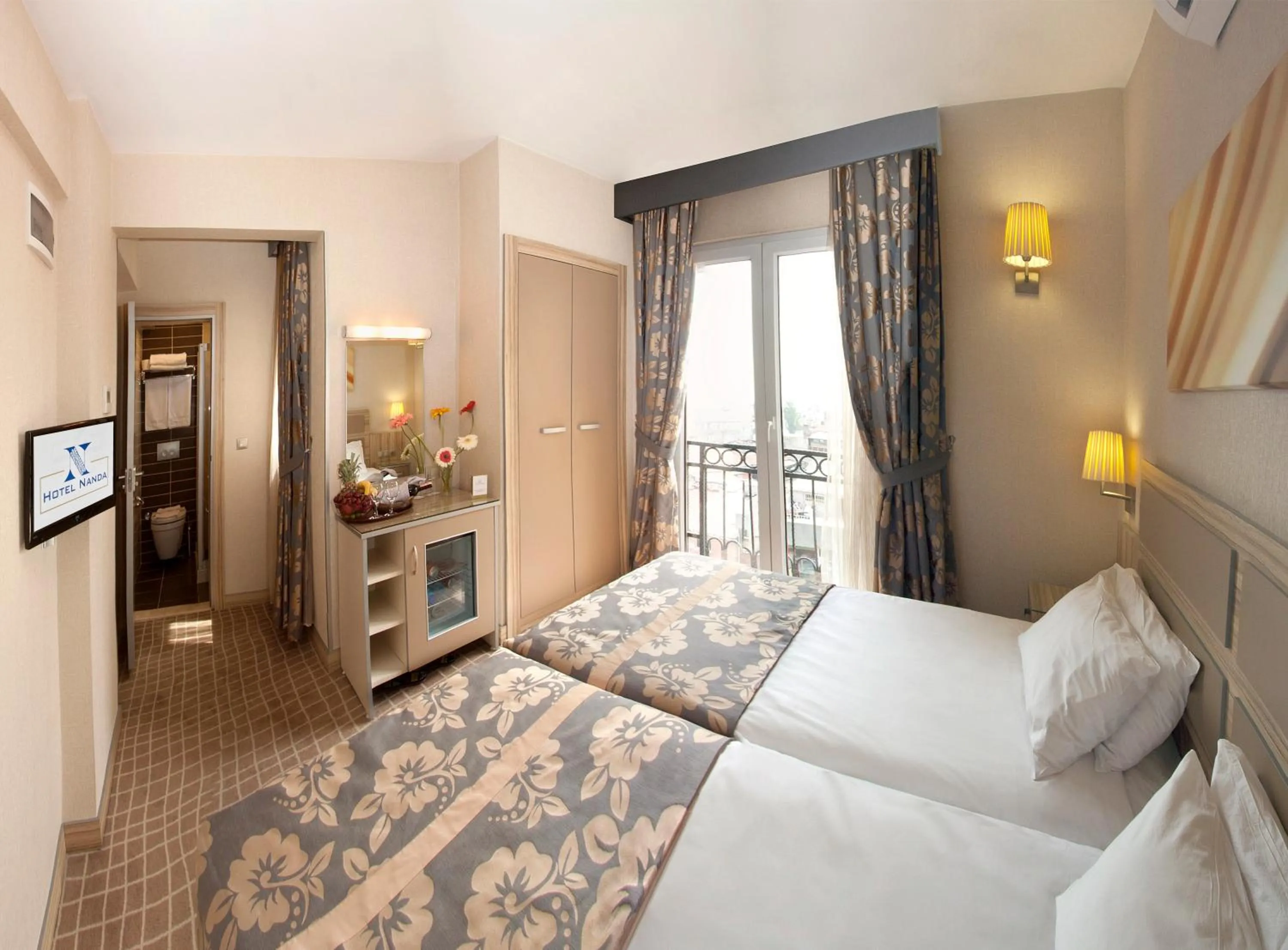 Photo of the whole room, Bed in Nanda Hotel