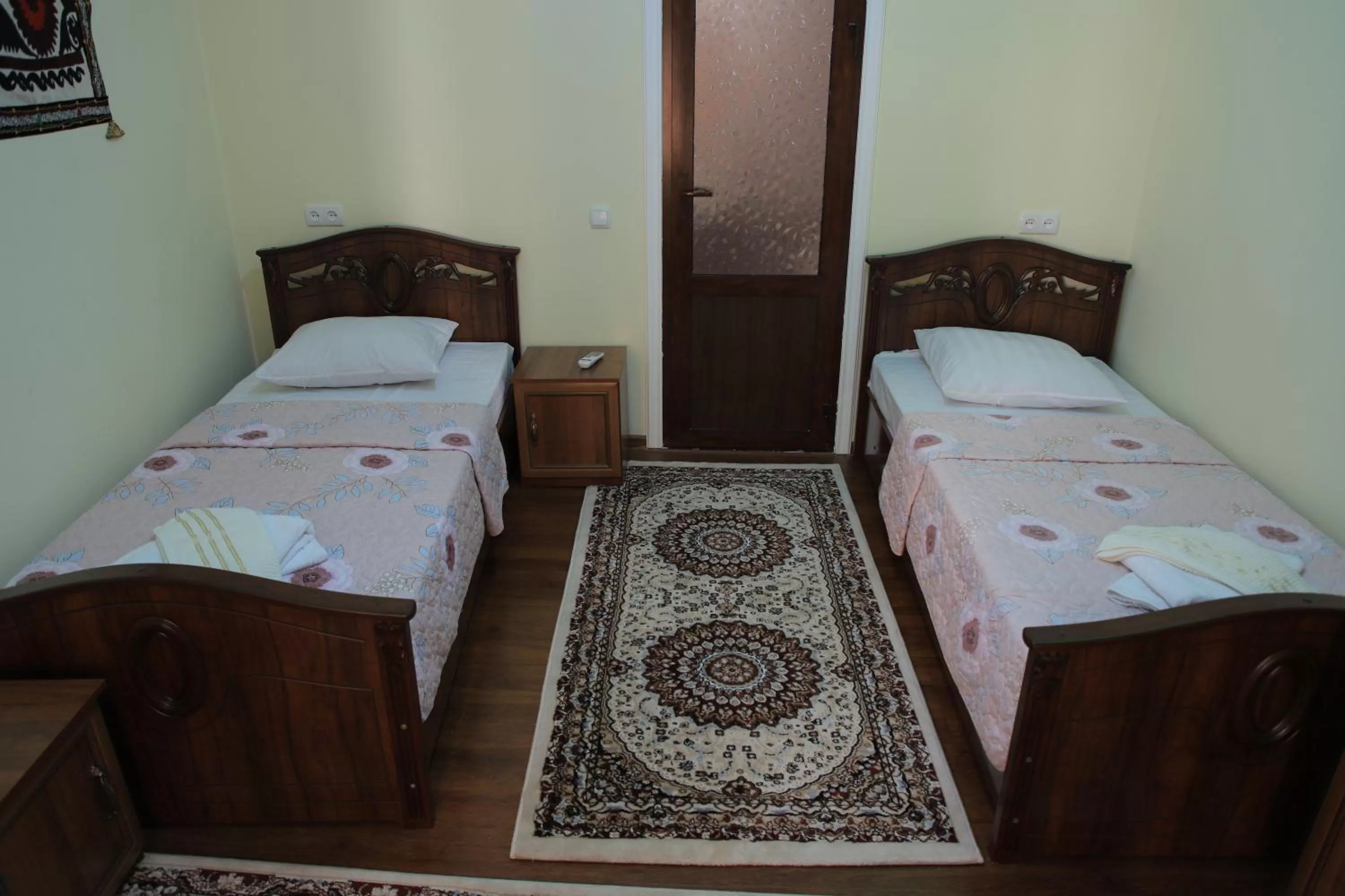 Bed in Tilyakori Hotel