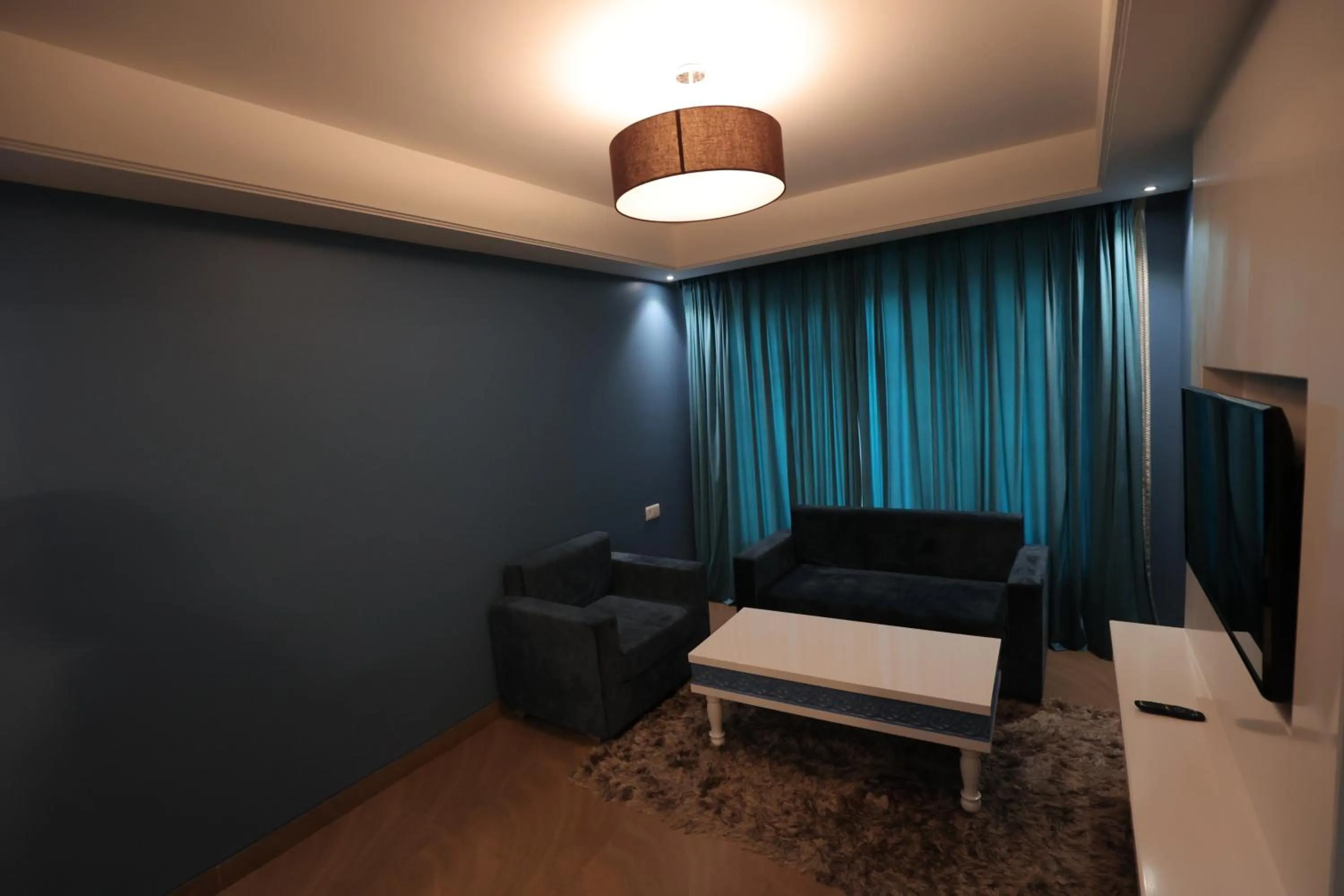 Living room, Seating Area in Clarion Inn Indore